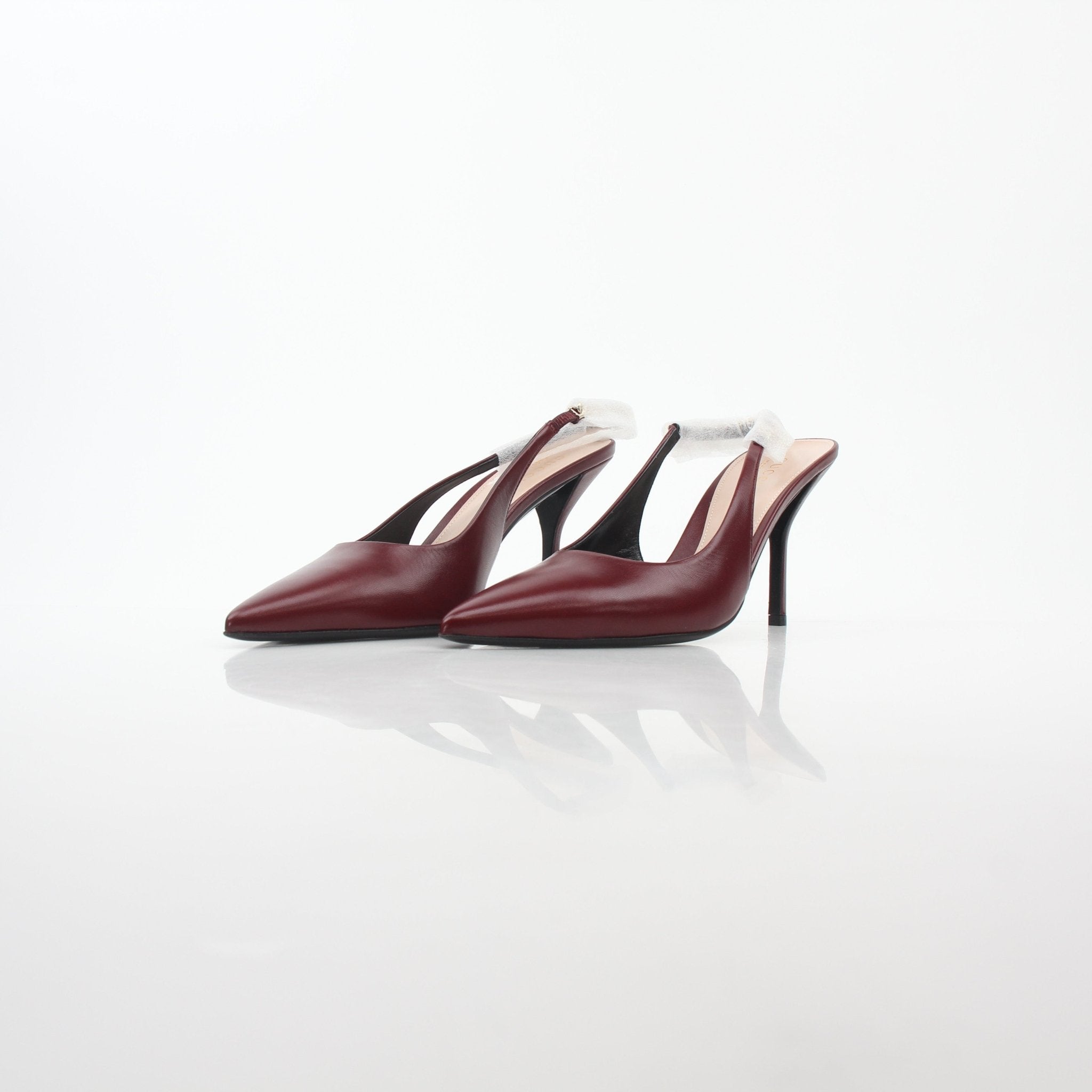 Gucci Signora Burgundy Leather Slingback Heels with pointed toe and elegant design, photographed on a white background.