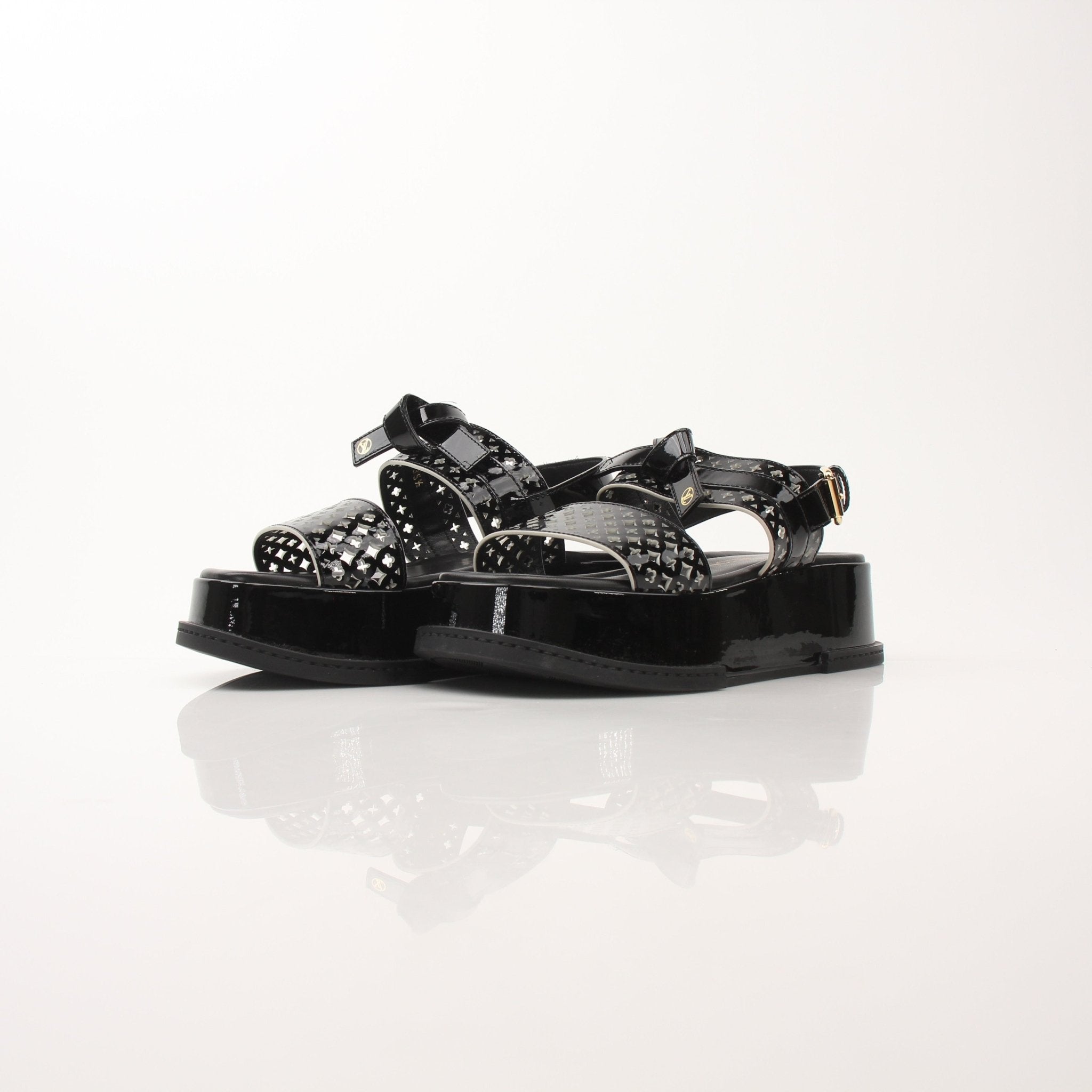 Louis Vuitton Women’s Maya Comfort Sandals in neutral tones, showcasing stylish slip-on shoes with cushioned soles.
