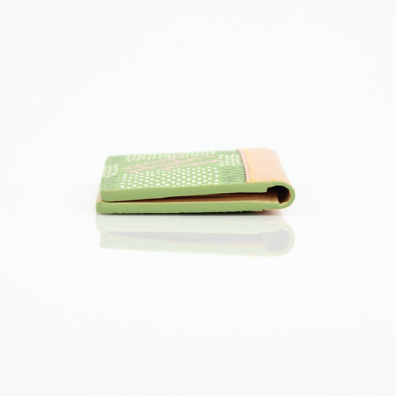 Louis Vuitton x Tyler The Creator green pocket organizer card holder with multiple card slots and logo details.