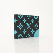 Louis Vuitton Playground Slender Wallet by Gold & Beyond, sleek leather wallet with multiple card slots and compact design.