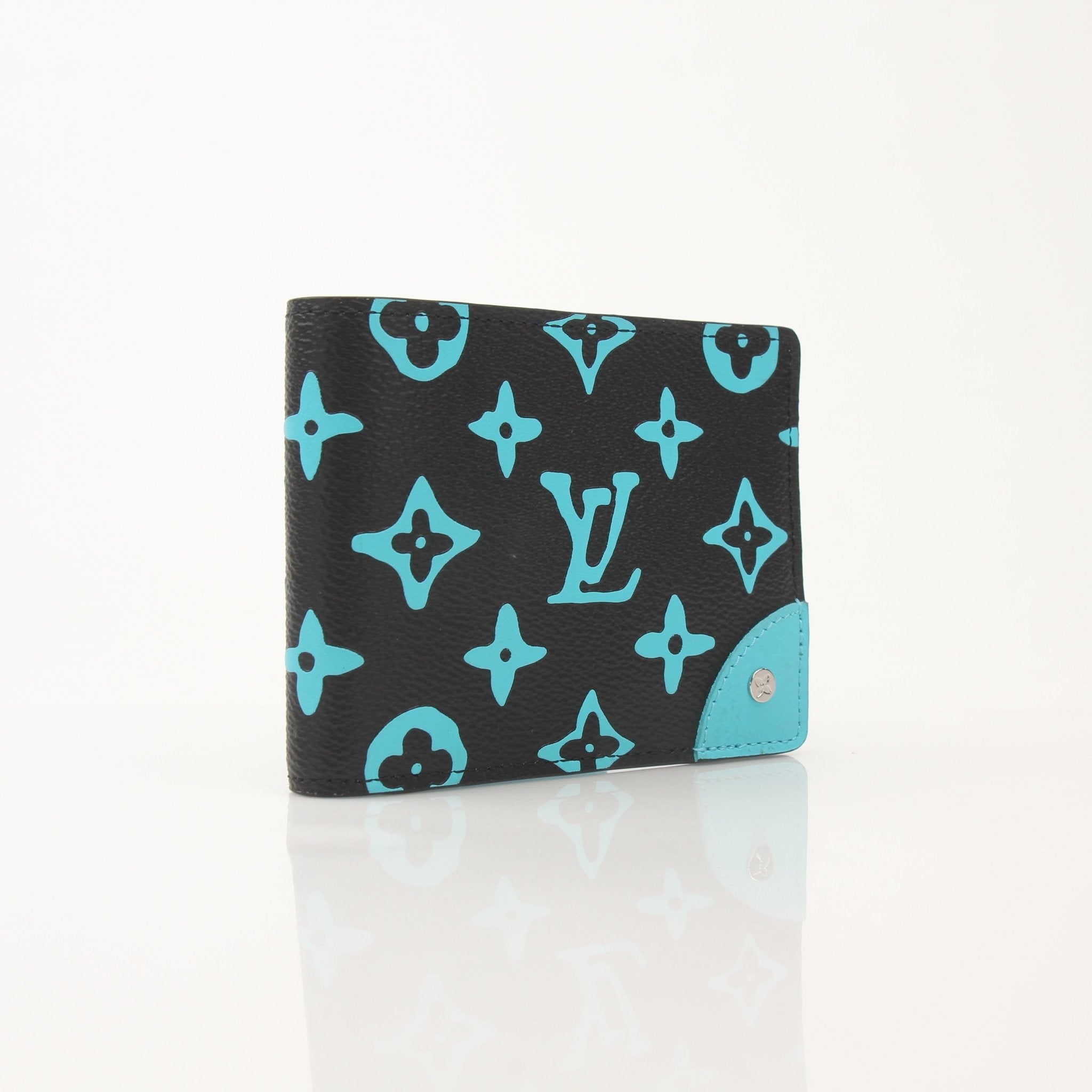 Louis Vuitton Playground Slender Wallet by Gold & Beyond, sleek leather wallet with multiple card slots and compact design.