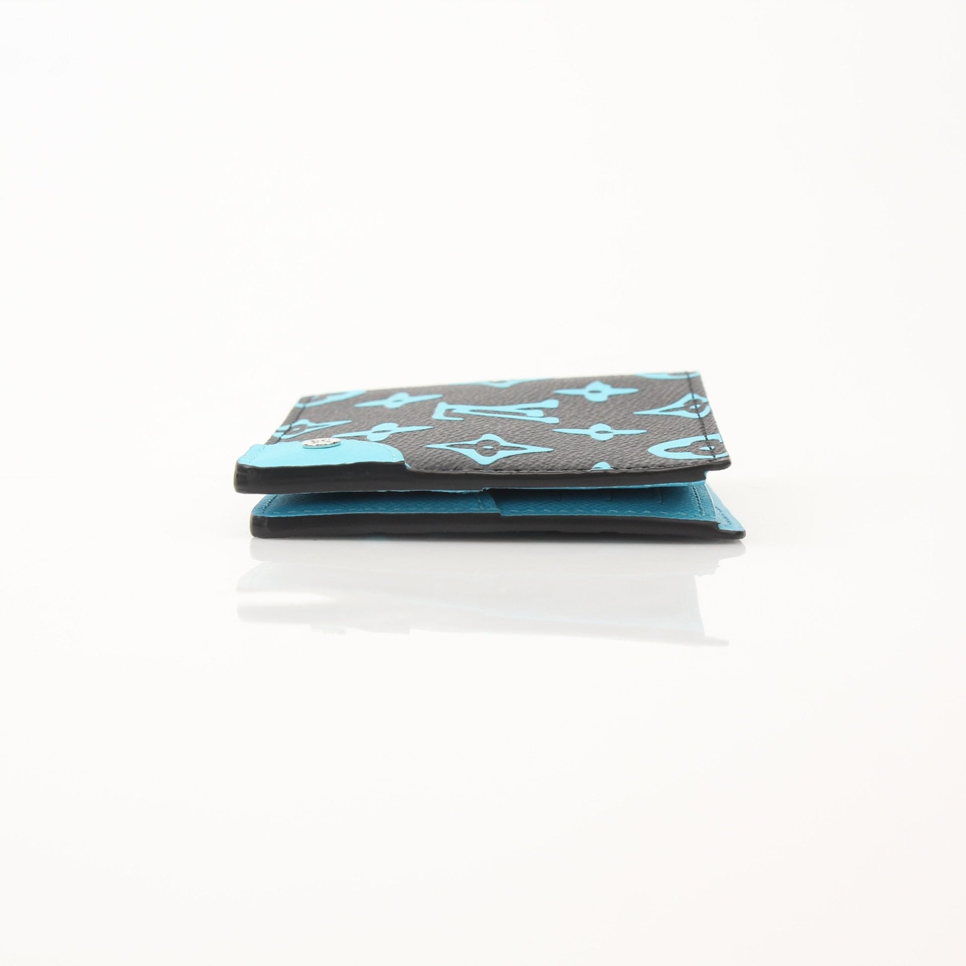 Louis Vuitton Playground Slender Wallet by Gold & Beyond, showcasing sleek design and premium leather with subtle branding.
