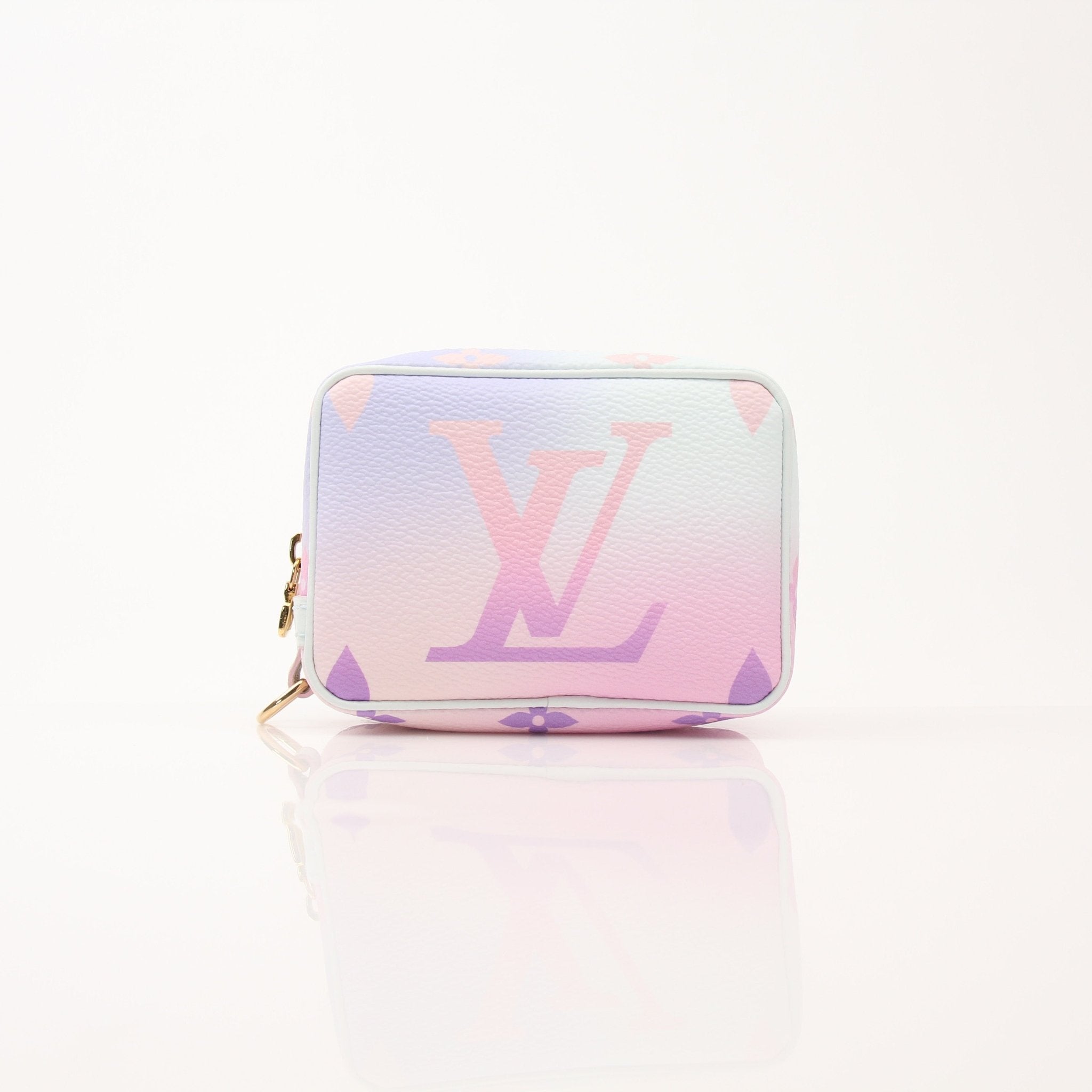 Louis Vuitton Sunrise Wapiti vanity case by Gold & Beyond with leather accents and gold hardware, open to show interior compartments.