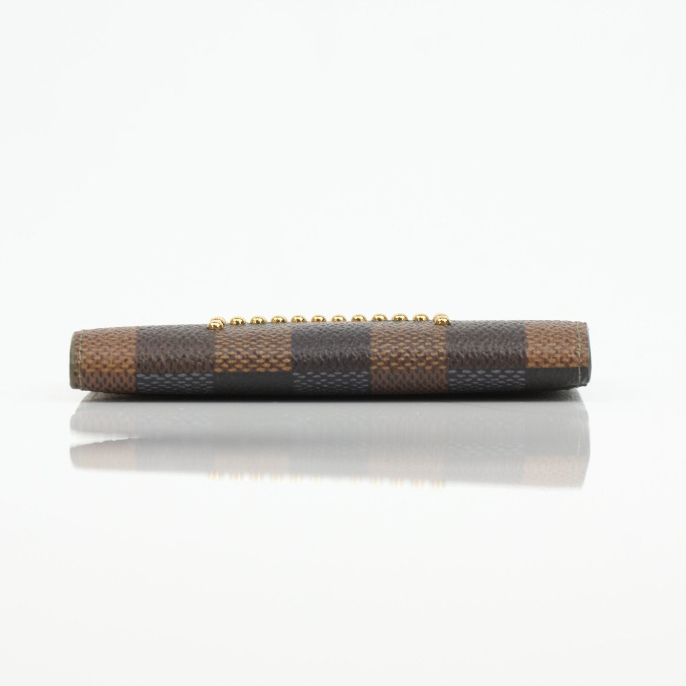 Louis Vuitton camo pocket organizer wallet by Gold & Beyond, featuring multiple card slots and compact design.