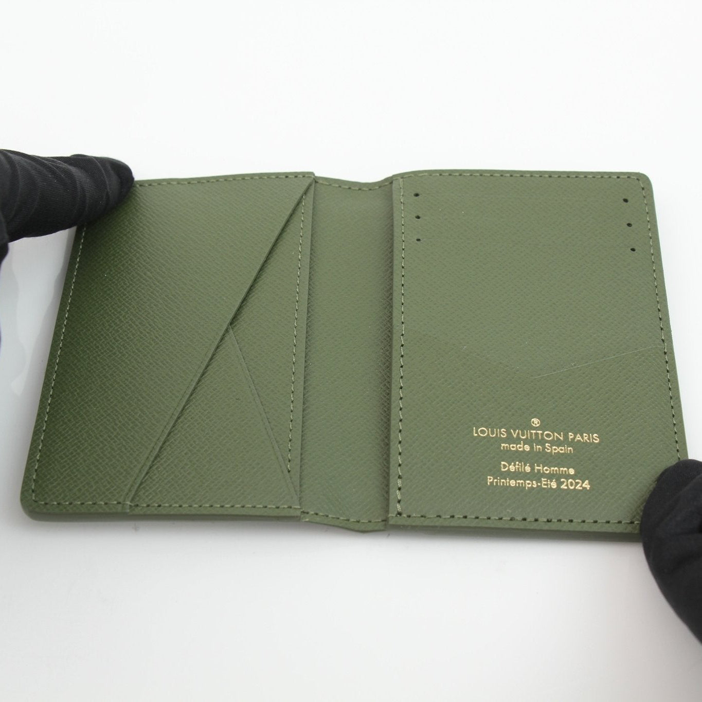 Louis Vuitton Camo Pocket Organizer wallet by Gold & Beyond, featuring camo design and multiple card slots on a neutral background.
