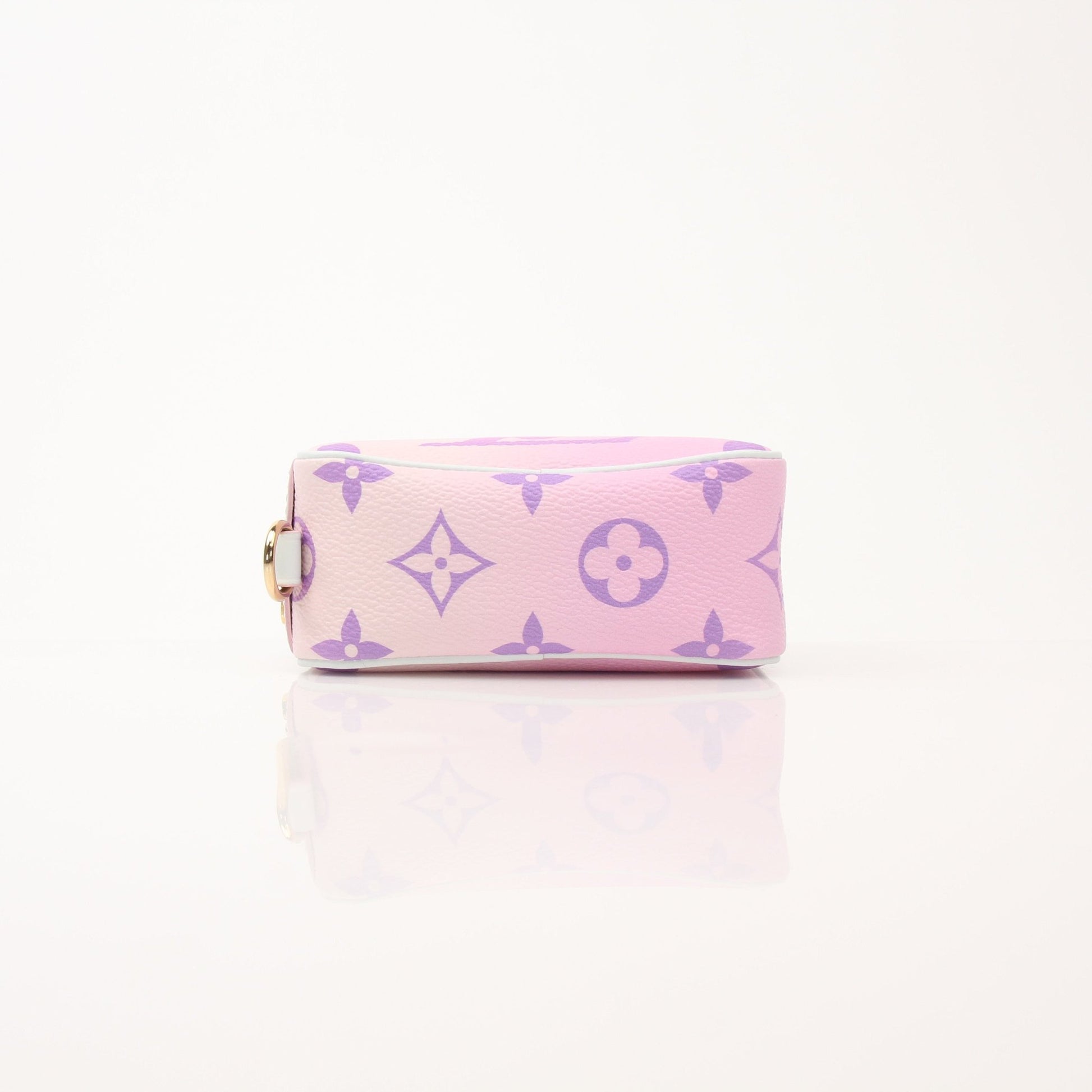 Louis Vuitton Sunrise Wapiti vanity case by Gold & Beyond, showcasing a luxurious patterned exterior with gold accents.