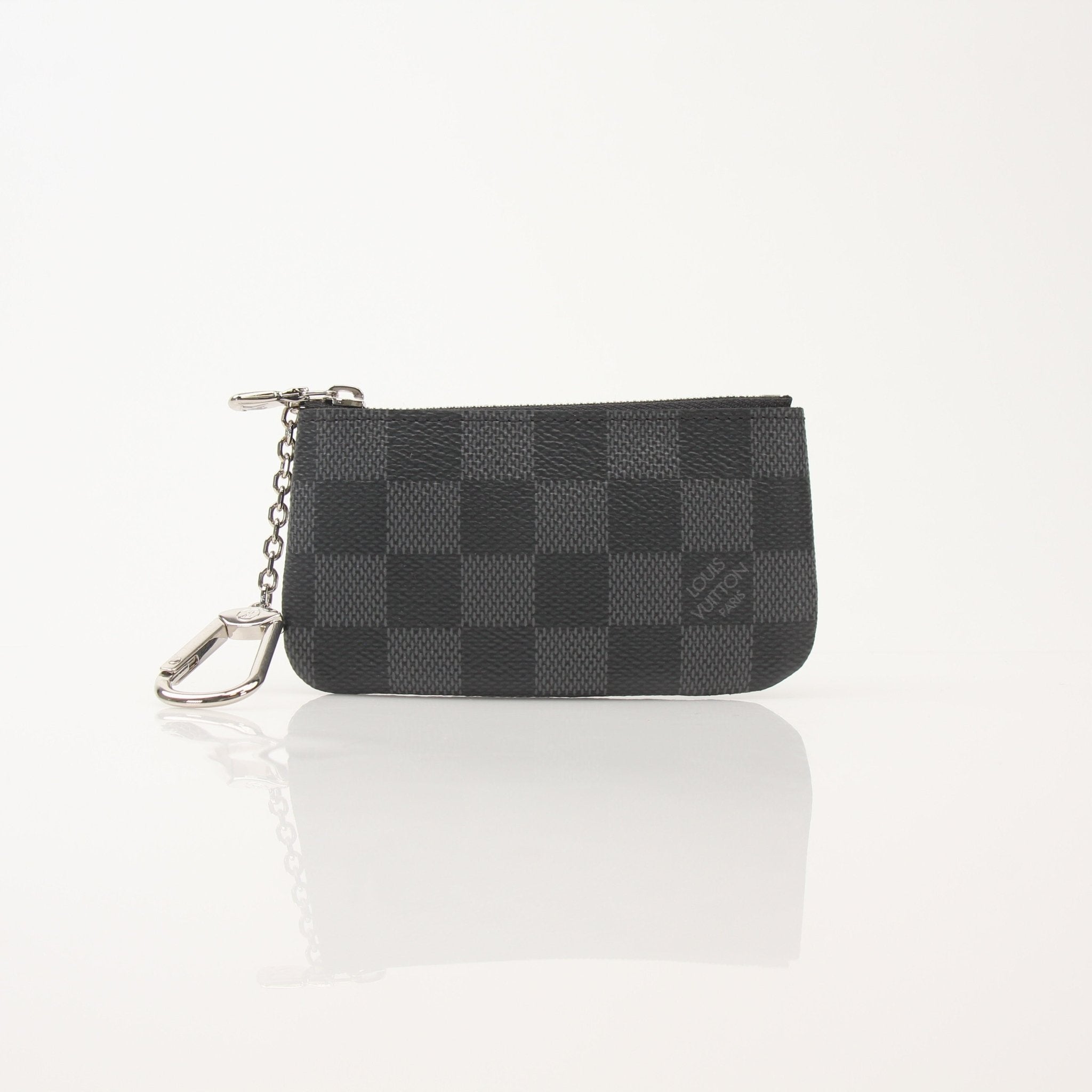 Louis Vuitton gold key pouch wallet from Gold & Beyond with leather accents and compact design.