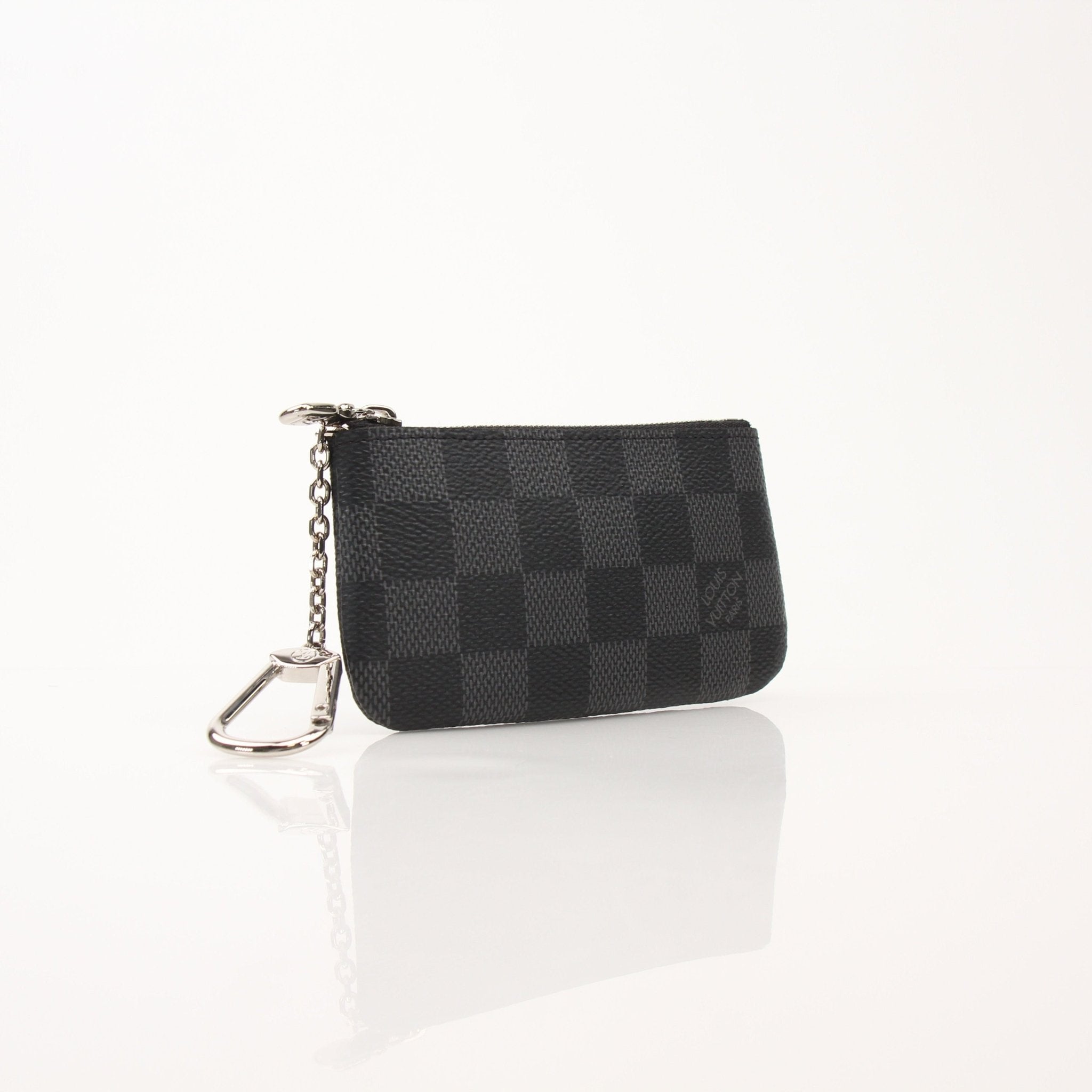 Louis Vuitton key pouch wallet by Gold & Beyond, featuring gold-tone hardware and textured leather with a compact, stylish design.