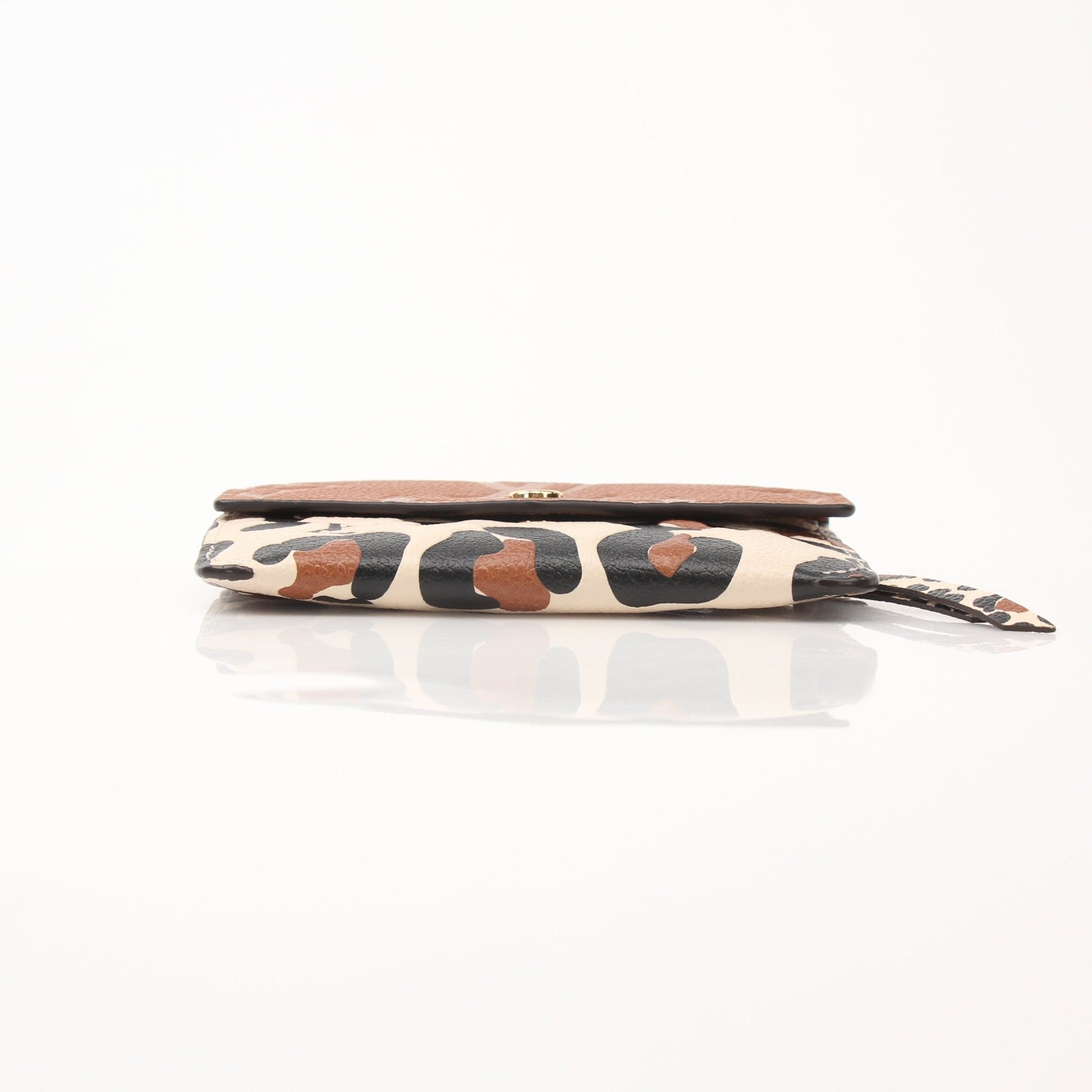 Louis Vuitton Wild at Heart wallet by Gold & Beyond, featuring signature canvas with vibrant heart and star pattern, compact and stylish.