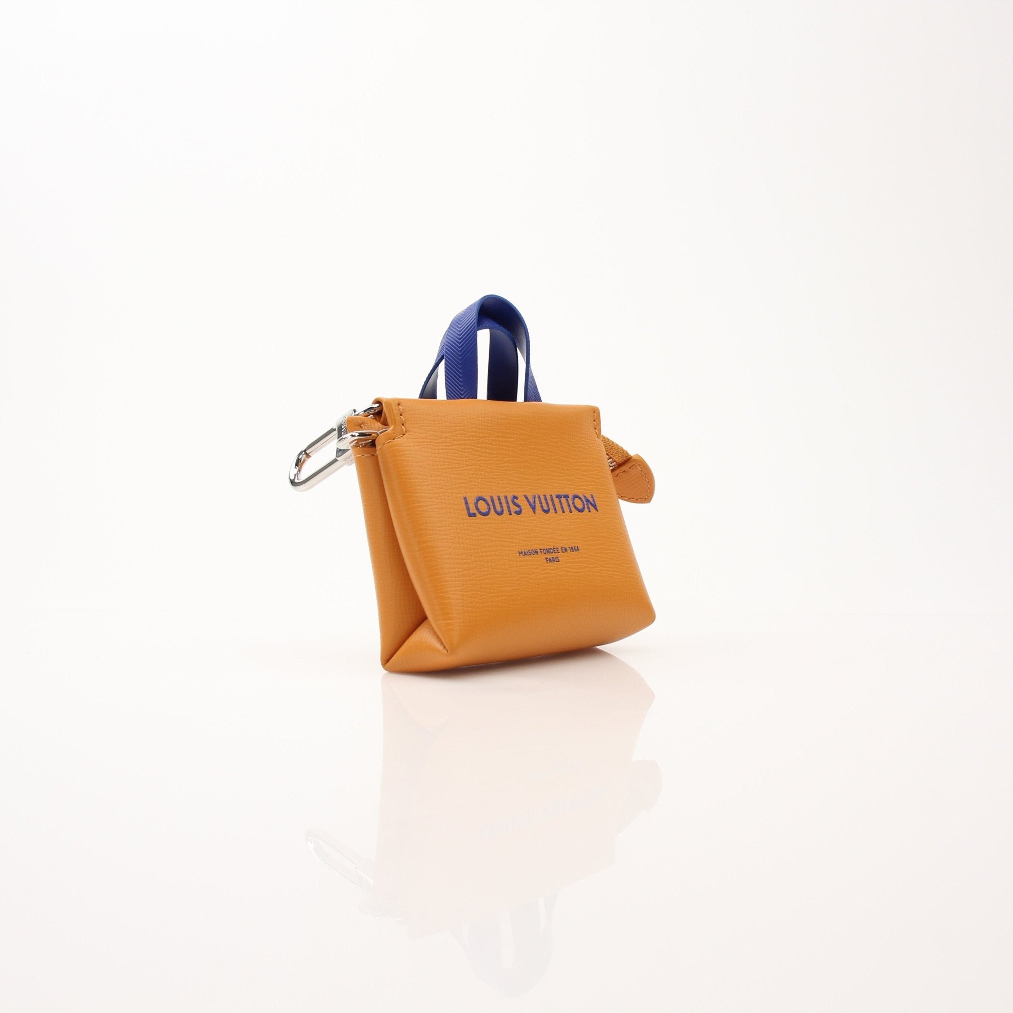Louis Vuitton Mini Tote Charm Bag Charm accessory featuring gold-toned hardware and detailed design, perfect for decorating handbags