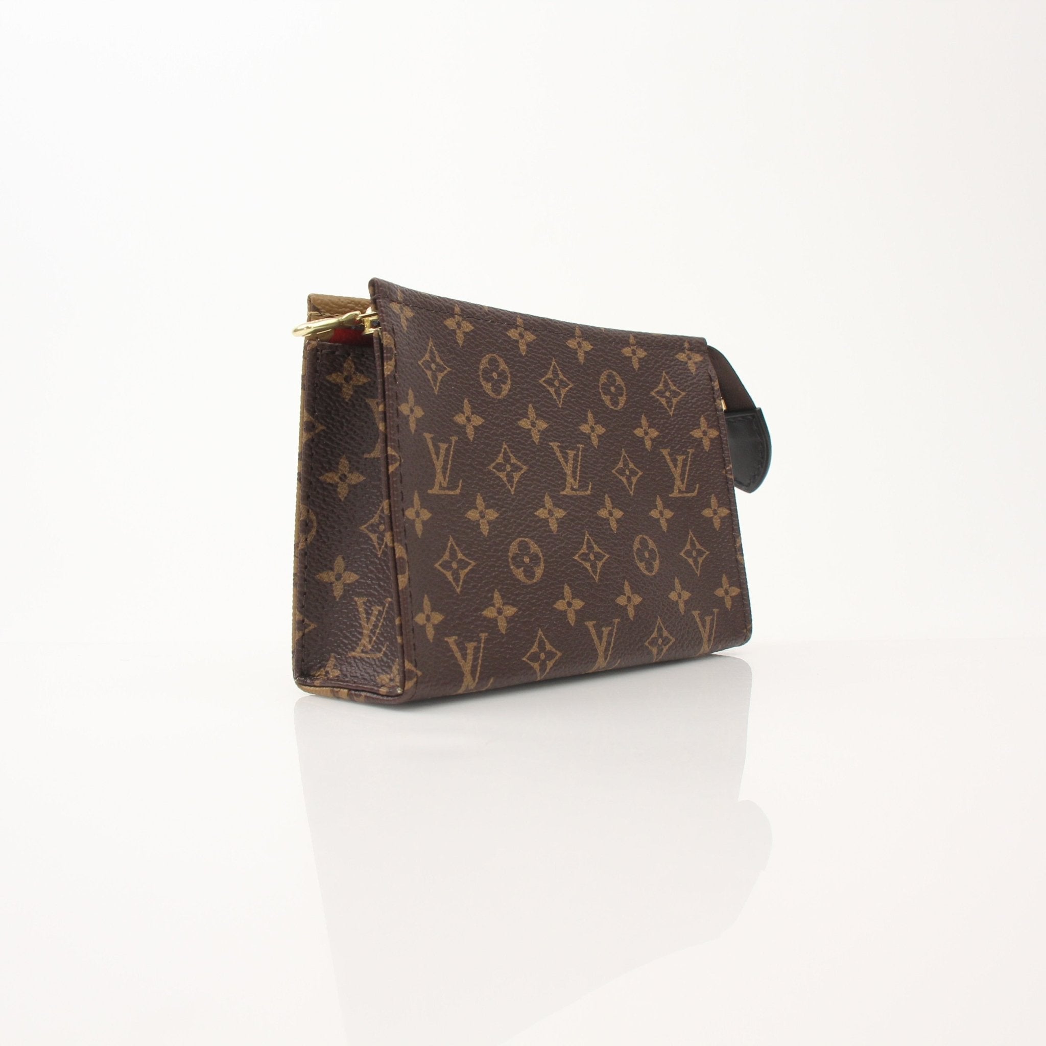 Louis Vuitton Toiletry Pouch 15 vanity case with gold zipper and monogram canvas, shown open with interior compartments.