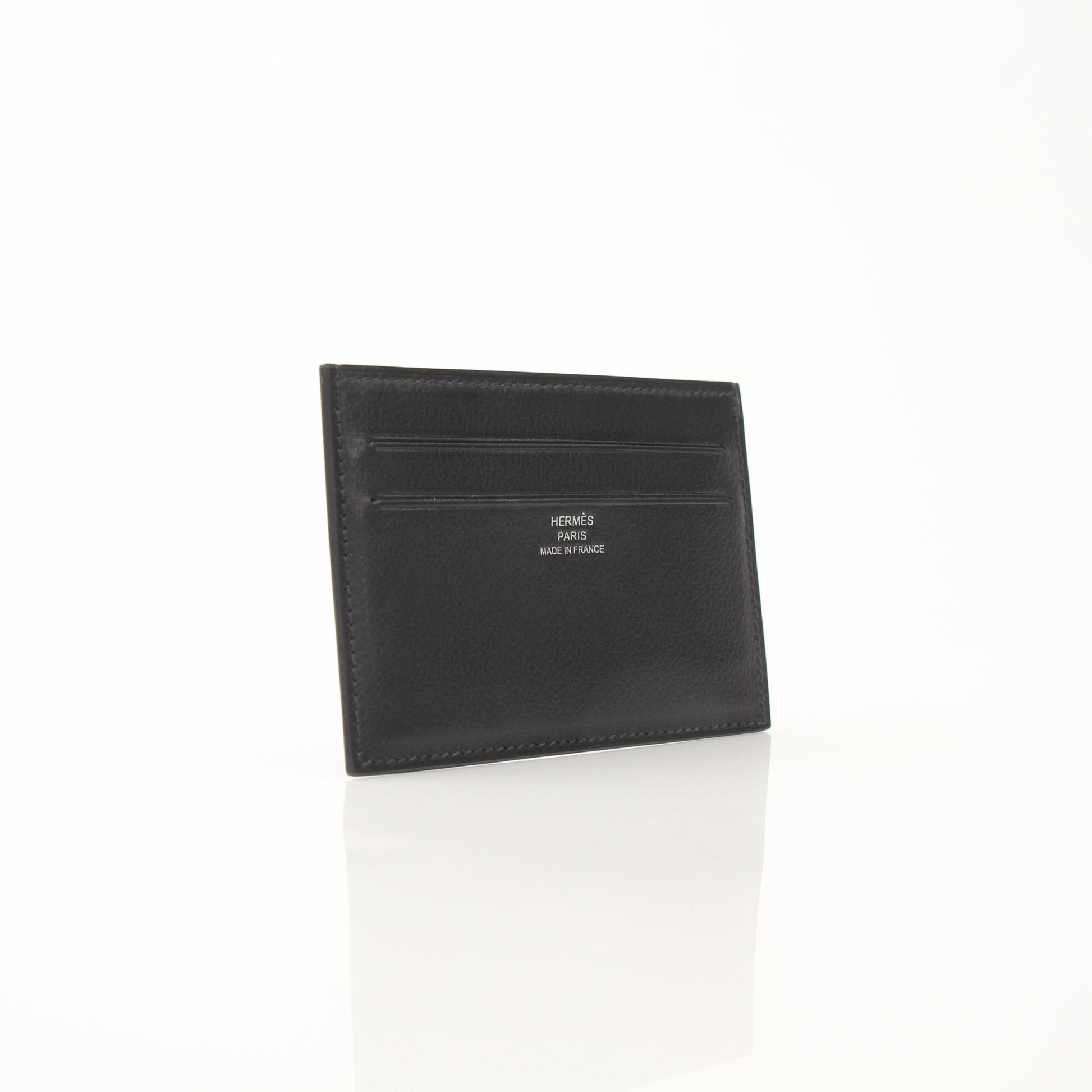 Hermès Citizen Twill Card Holder by Gold & Beyond, featuring a sleek fabric design with multiple card slots and a compact style.