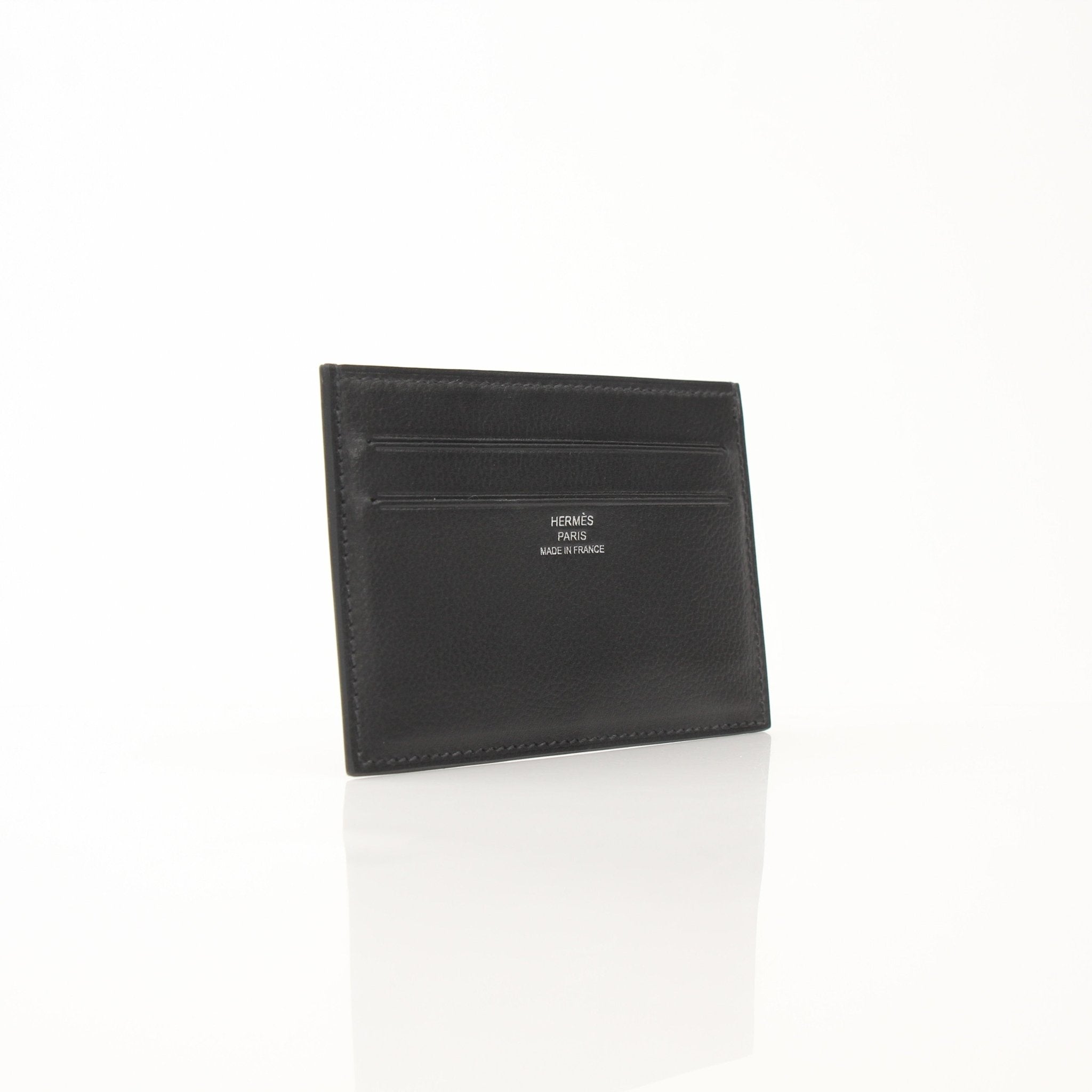 Hermès Citizen Twill Card Holder by Gold & Beyond, featuring a sleek fabric design with multiple card slots and a compact style.