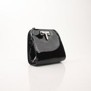 Black Tom Ford Black Cosmo handbag by Gold & Beyond, featuring a sleek design and elegant gold accents.