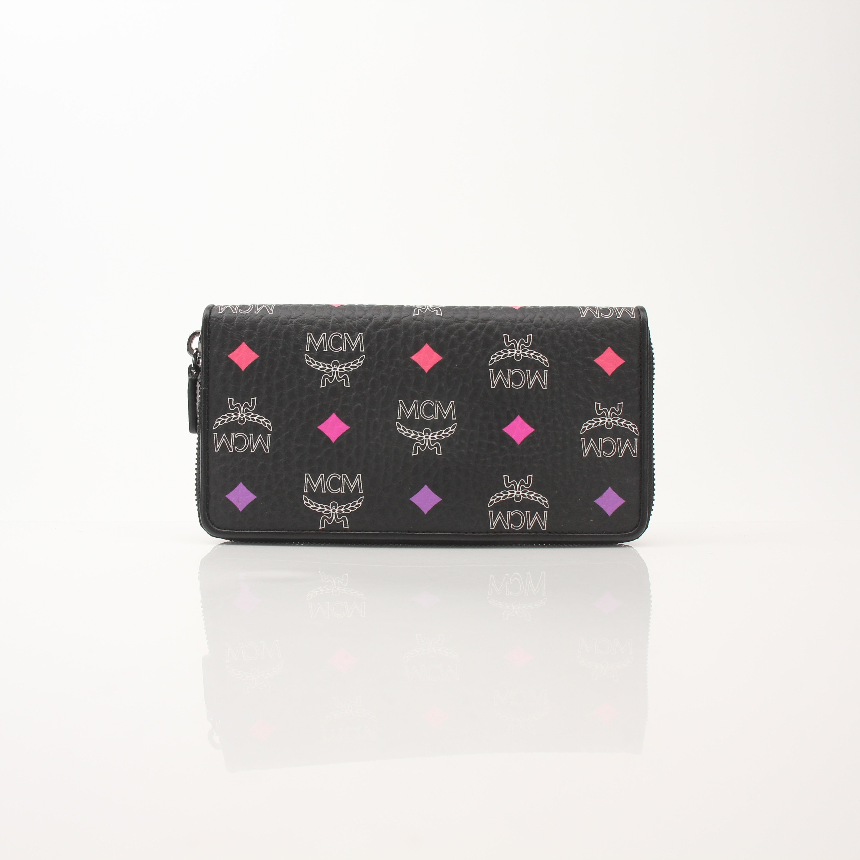 MCM Visetos Diamond Spectrum Zip Around Wallet by Gold & Beyond, featuring a patterned design and gold-tone zipper closure.