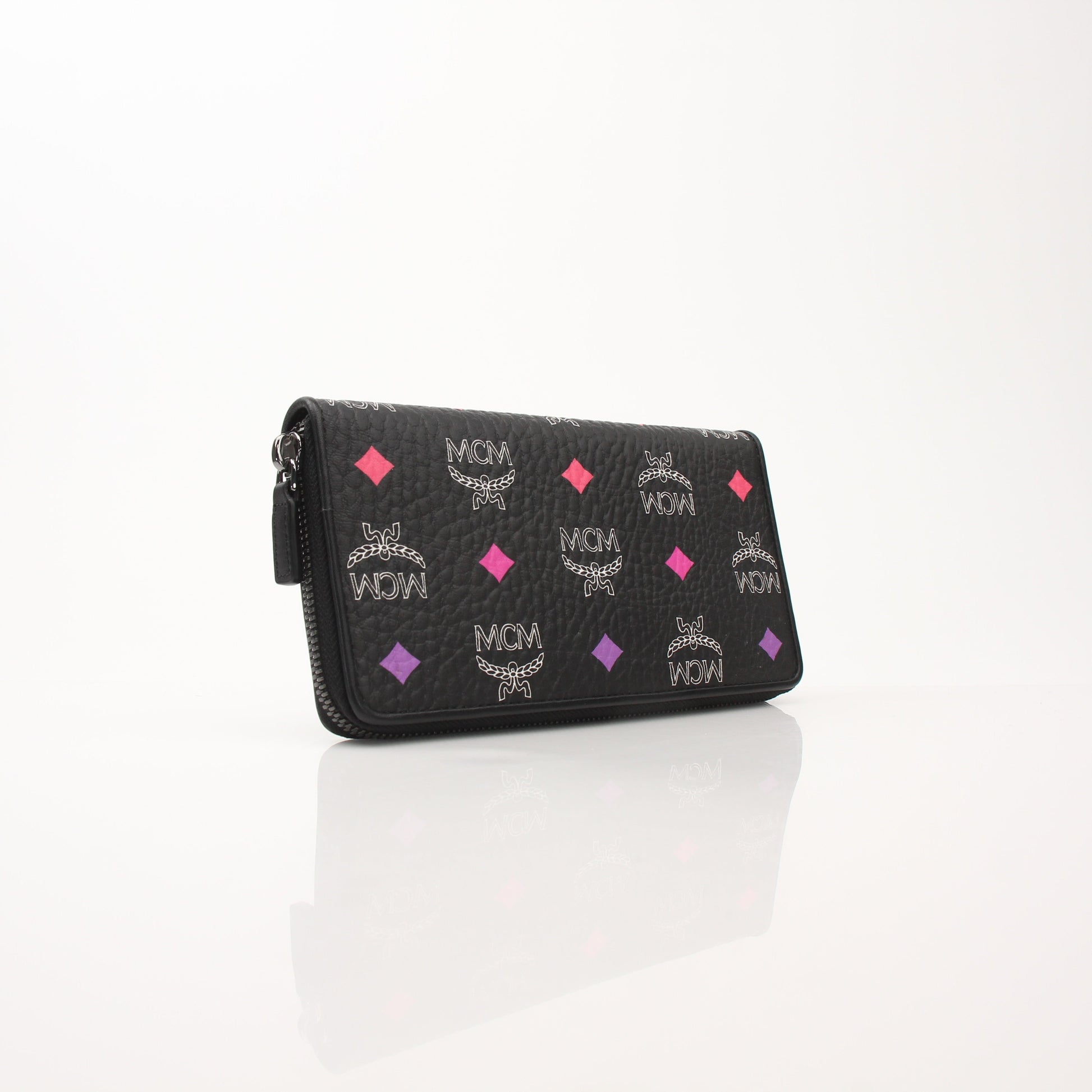 Gold & Beyond MCM Visetos Diamond Spectrum zip around wallet with logo pattern and multiple card slots, shown open on a white background.