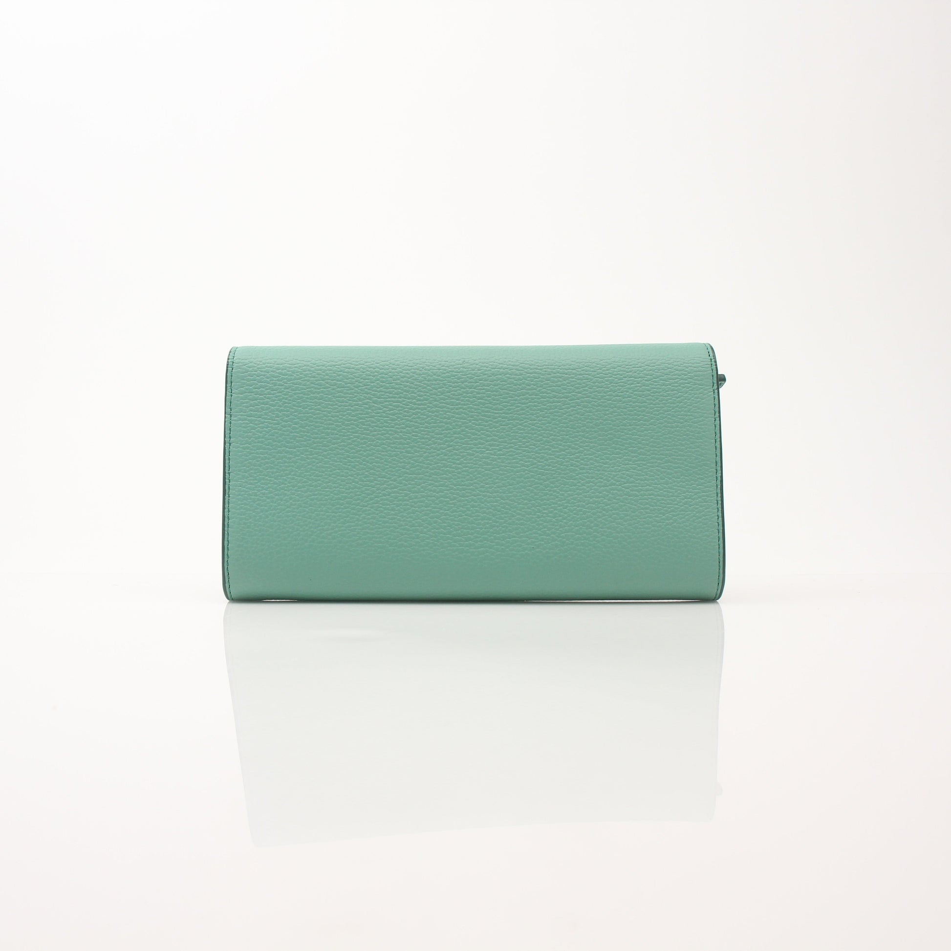 MCM Millie Mint Wallet on Chain by Gold & Beyond, featuring a sleek mint green leather wallet with chain strap and gold-tone accents.
