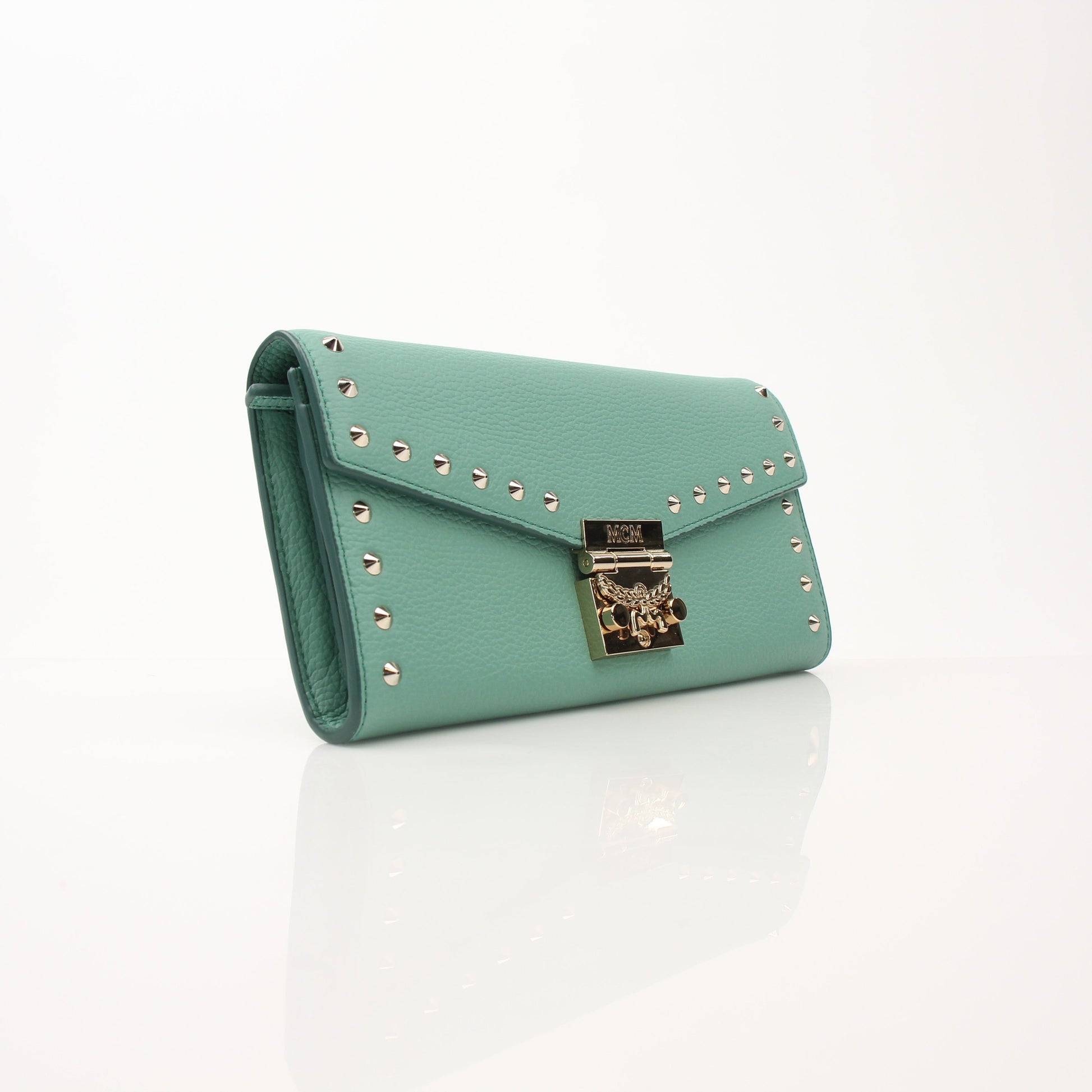 Gold & Beyond MCM Millie Mint Wallet on Chain with gold-tone hardware and textured leather, showing the compact design and chain strap.
