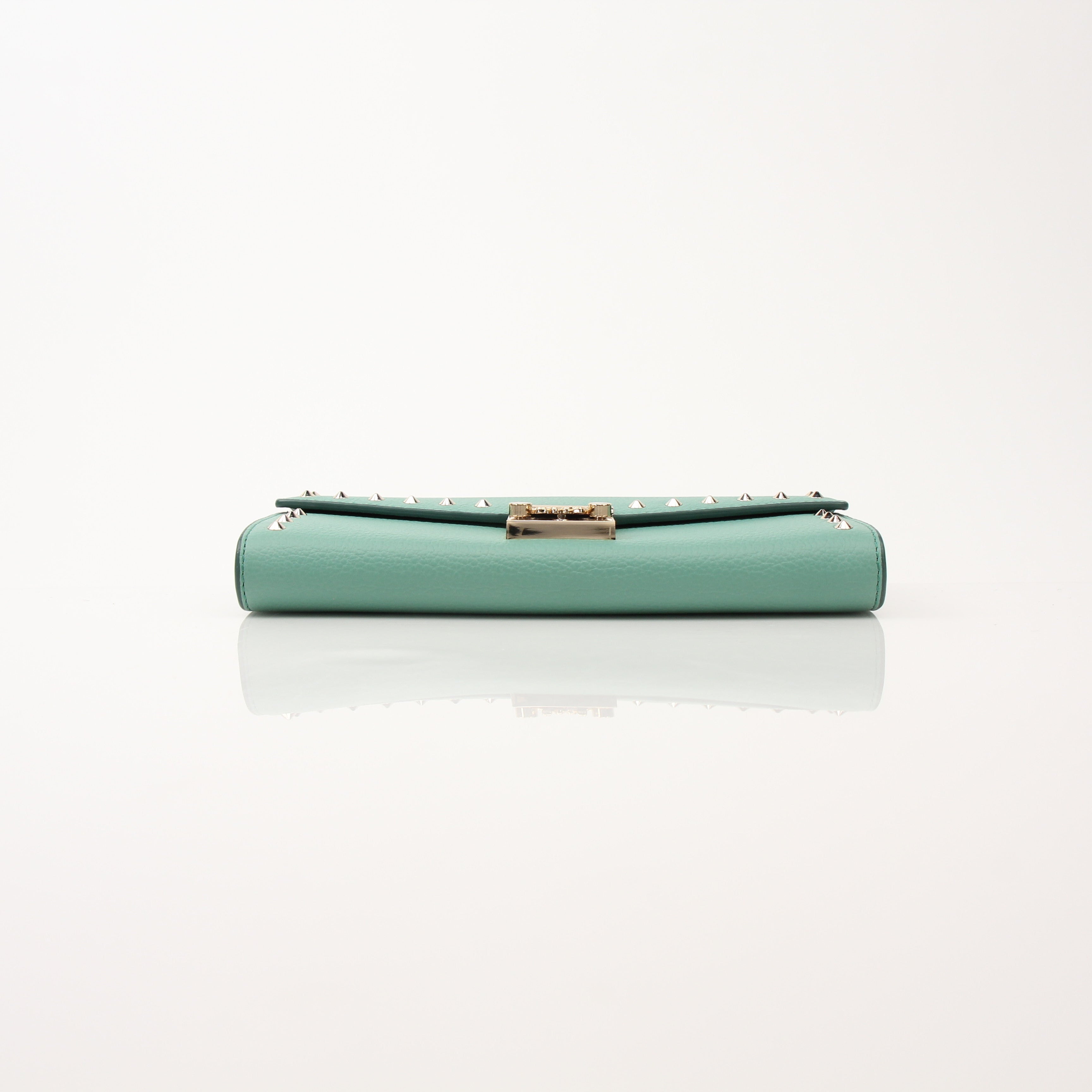 Gold & Beyond MCM Millie Mint wallet on chain, stylish leather wallet with chain strap, in vibrant mint green color.
