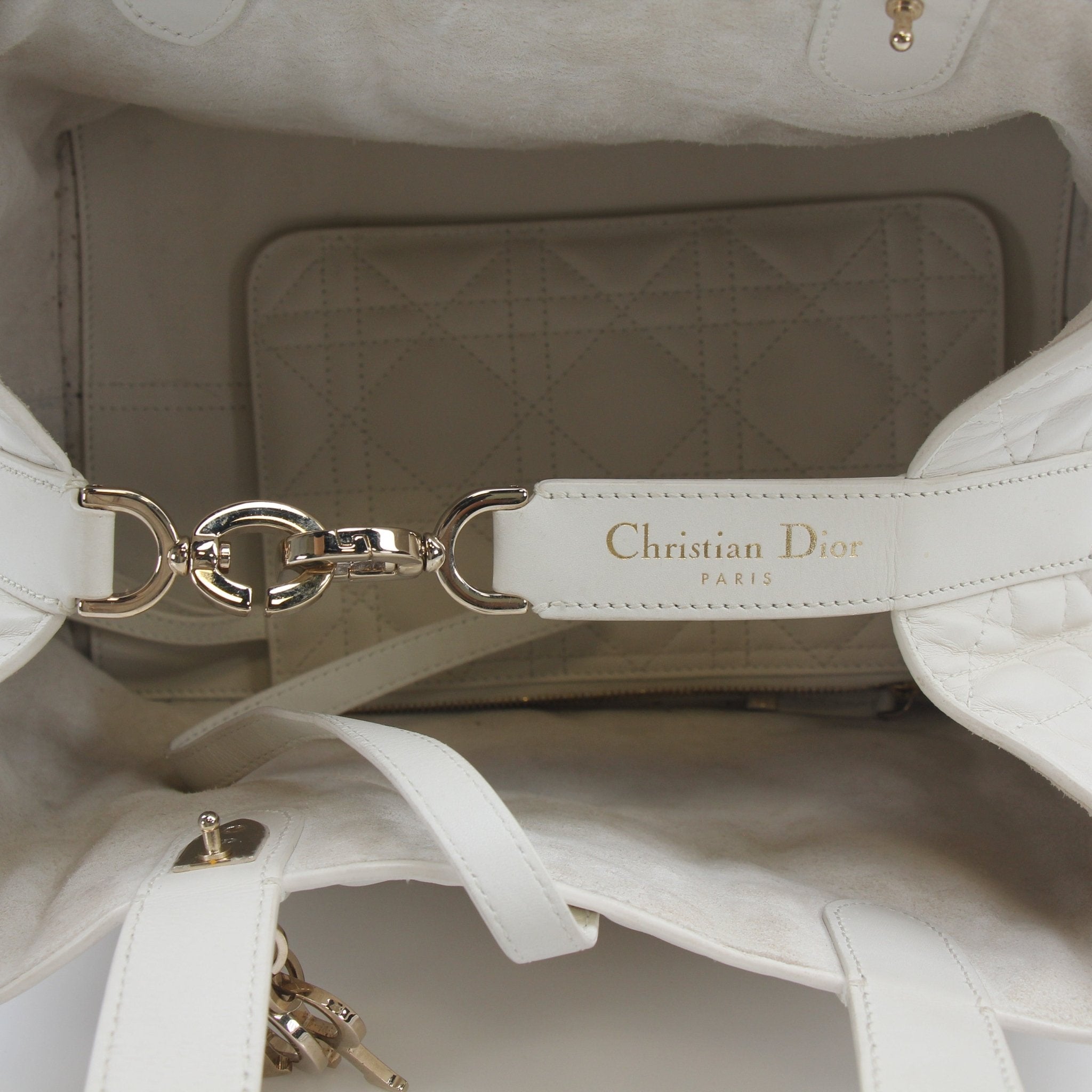 Christian Dior Latte Macrocannage Toujours Tote Bag by Gold & Beyond, showcasing elegant handbag design with structured shape and top handles.