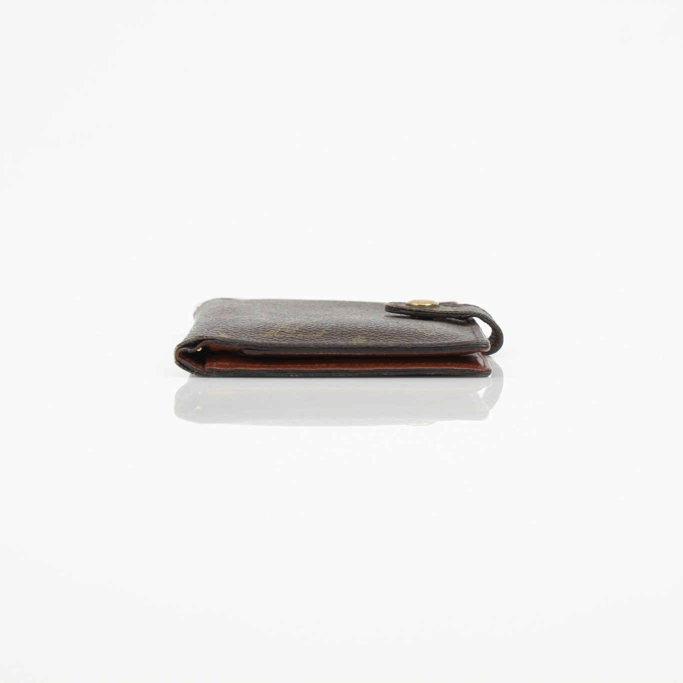 Louis Vuitton Monogram Agenda Cover wallet with gold accents, featuring signature monogram pattern and compact, stylish design.