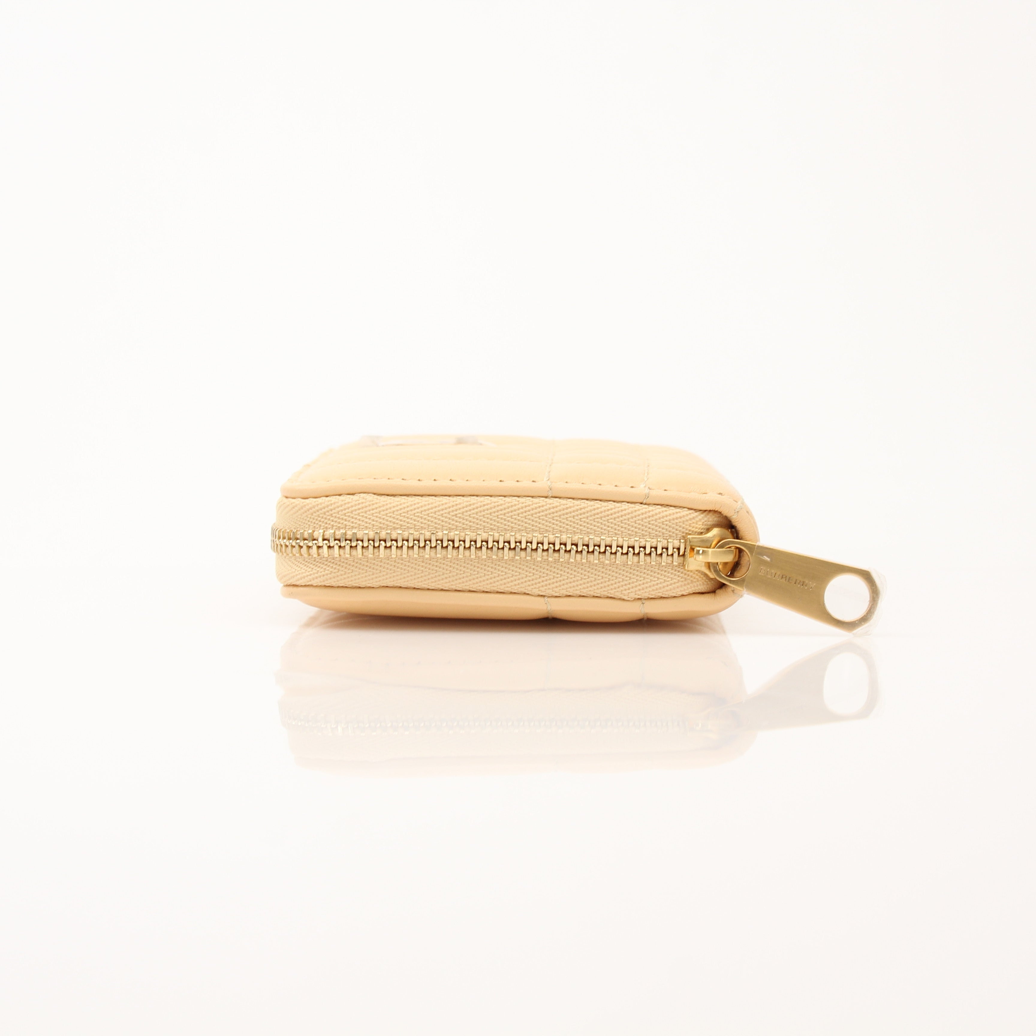 Gold & Beyond Burberry Lola Mini Wallet showing the quilted leather exterior and gold-tone logo hardware.