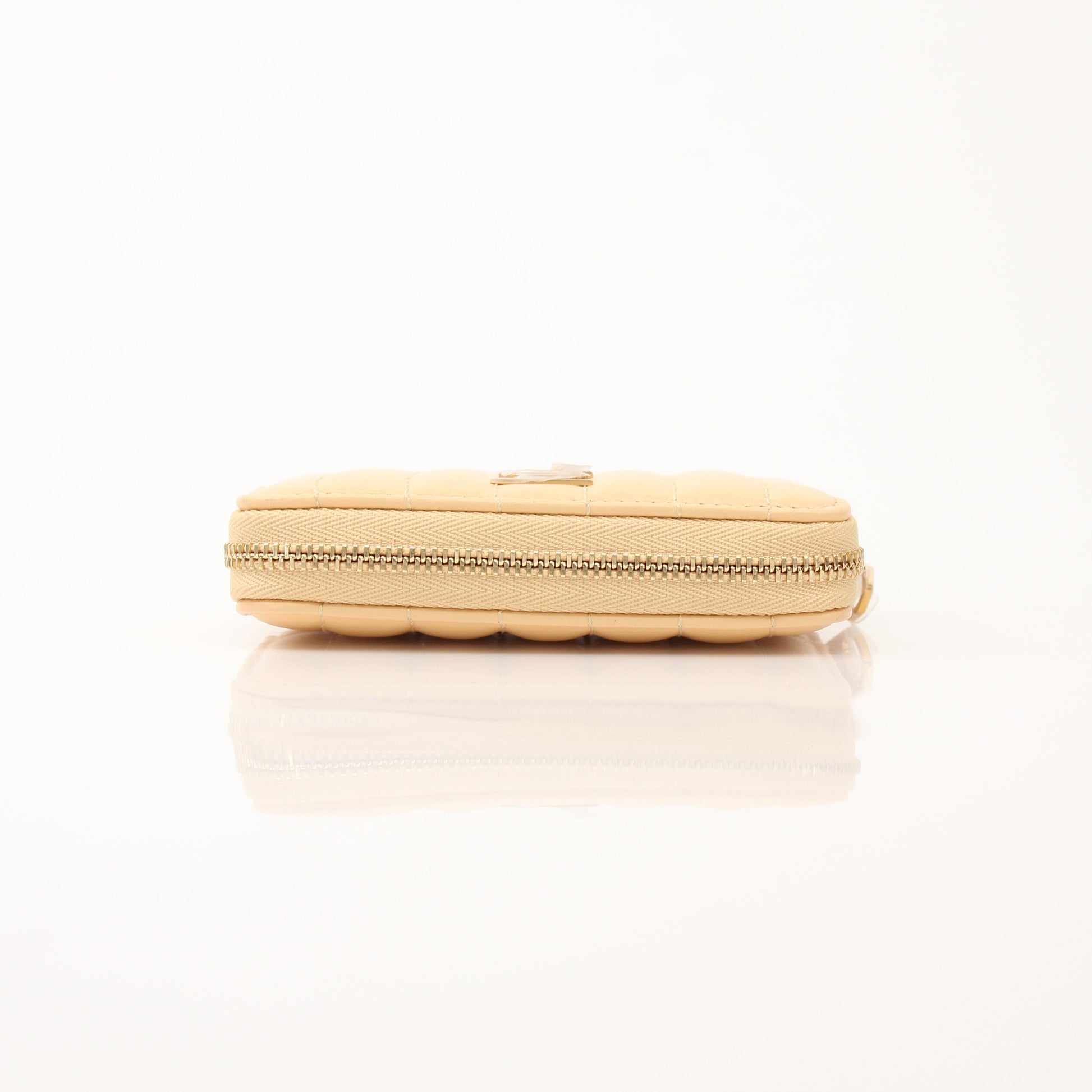 Gold & Beyond Burberry Lola Mini Wallet with signature check pattern and gold-tone logo details on a sleek leather surface.