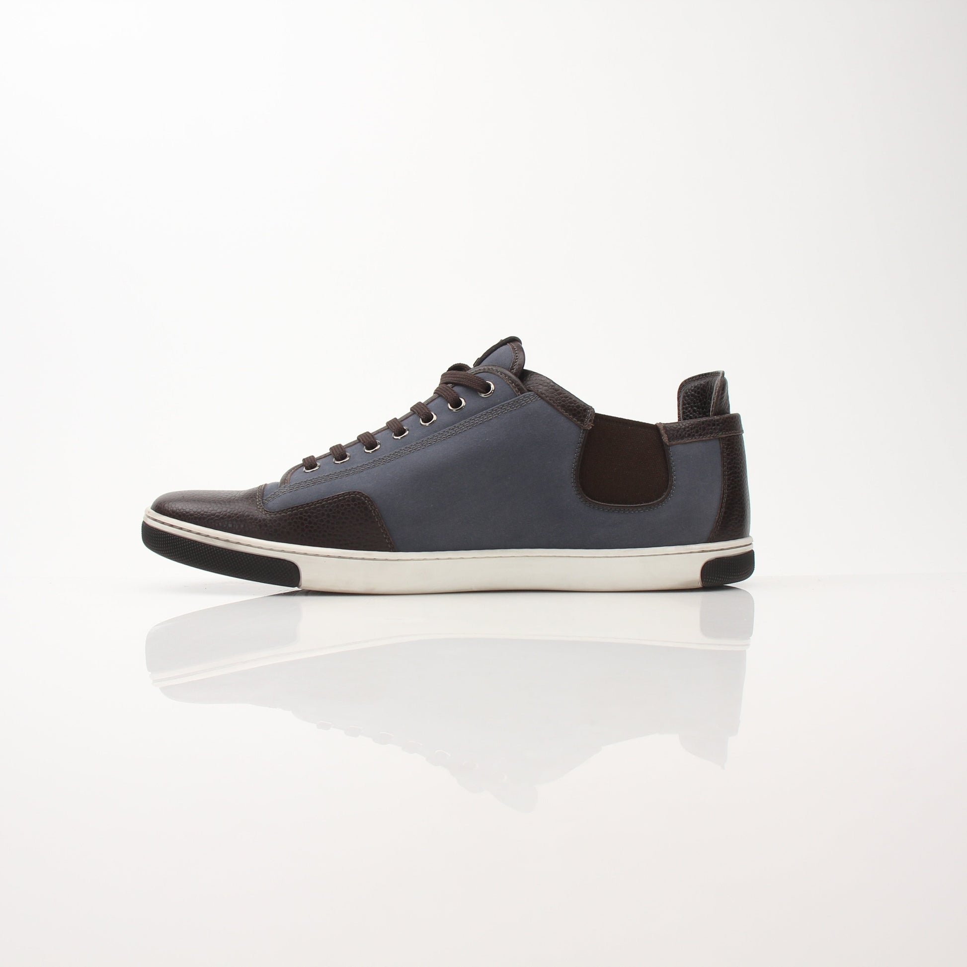 Louis Vuitton Men’s Shalom Leather Sneakers in black with gold accents, stylish shoes featuring smooth leather and lace-up design.