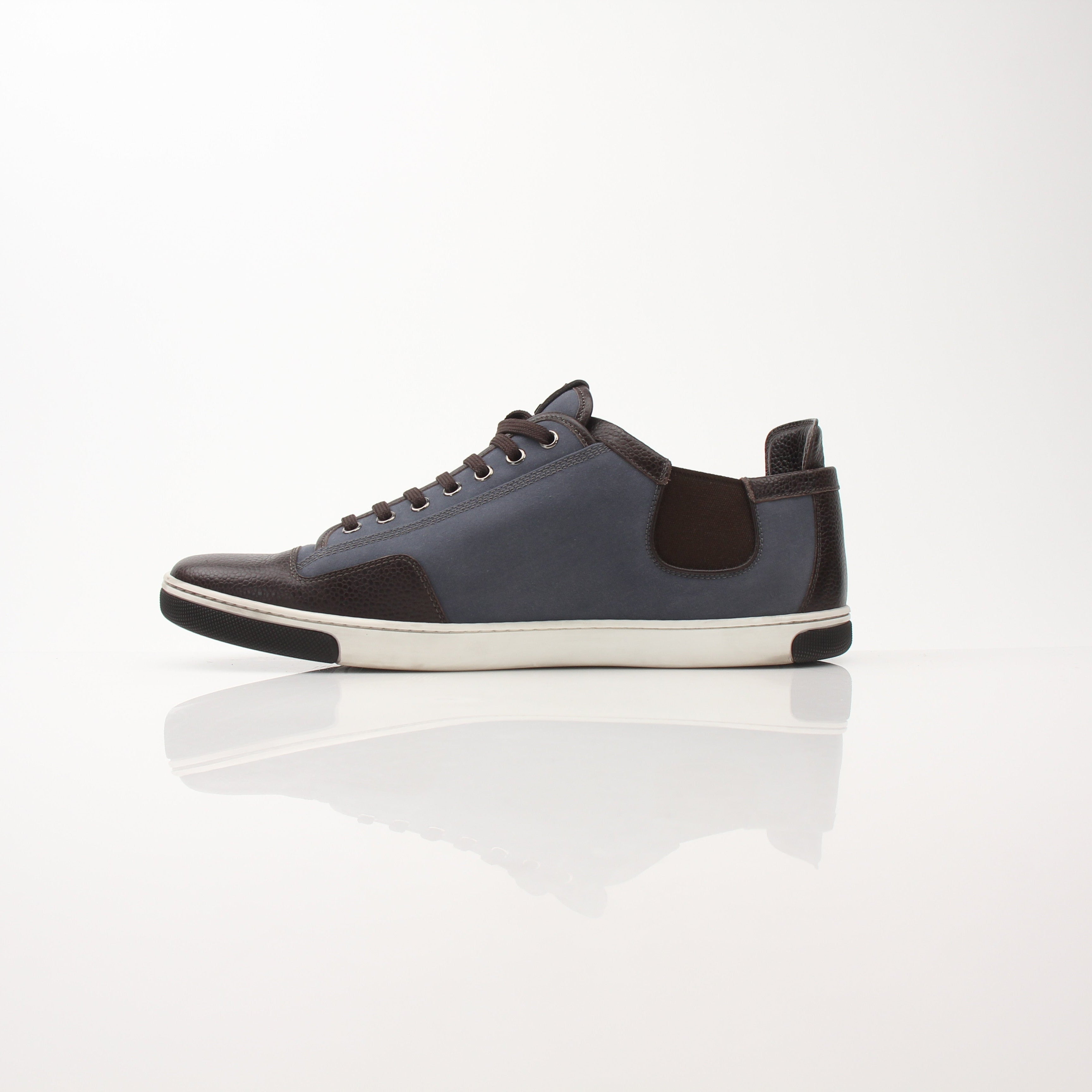 Louis Vuitton Men’s Shalom Leather Sneakers in black with gold accents, stylish shoes featuring smooth leather and lace-up design.