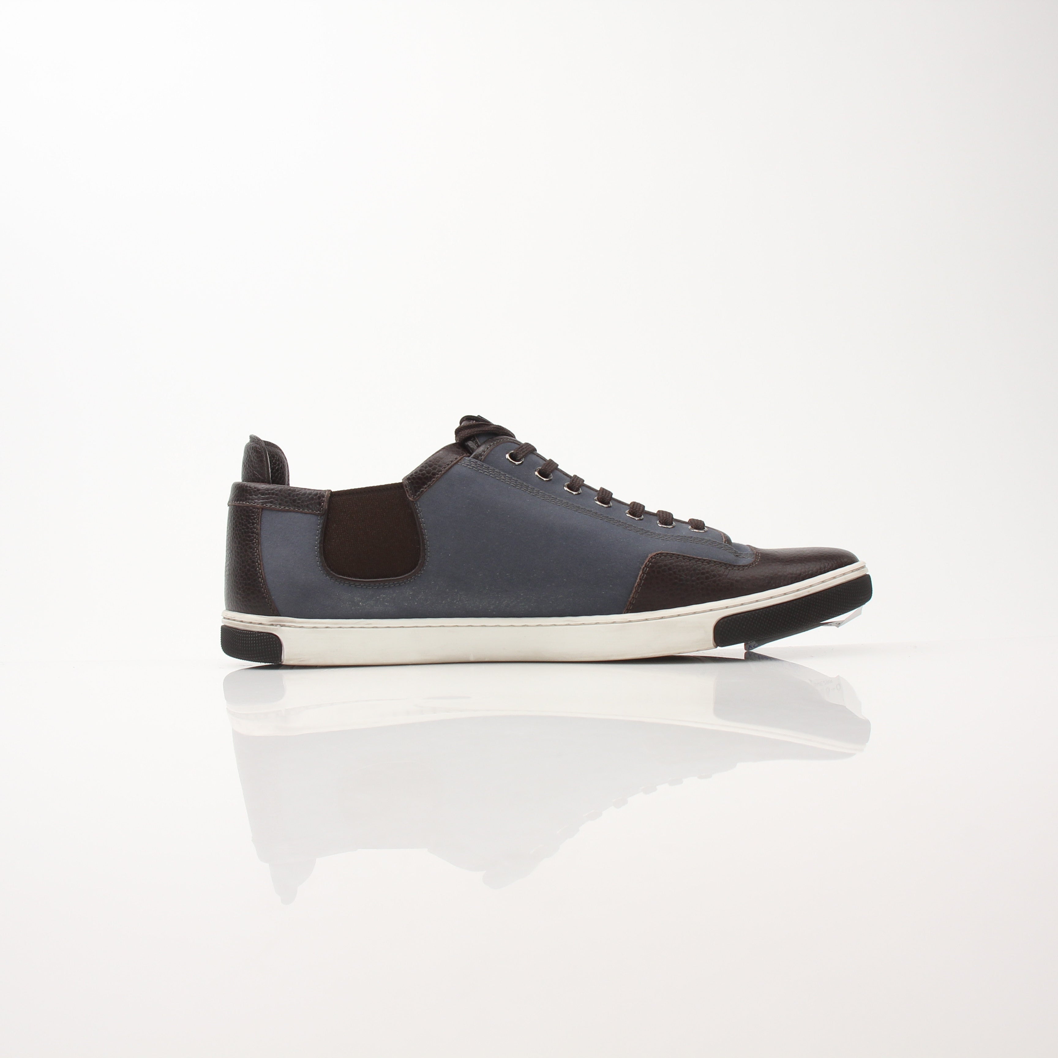 Louis Vuitton Men’s Shalom Leather Sneakers by Gold & Beyond, showcasing stylish black leather shoes with white soles.