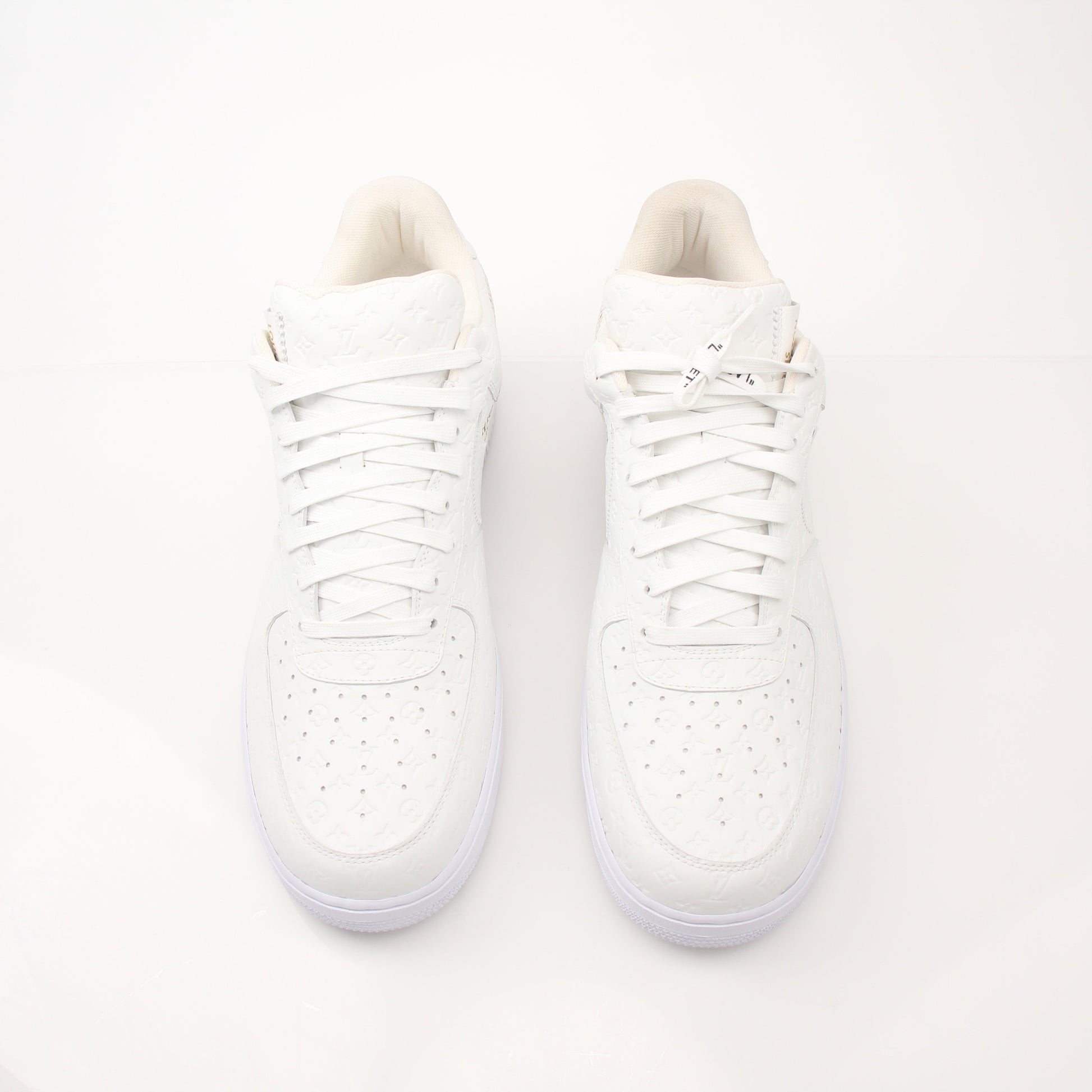 Louis Vuitton x Nike Air Force 1 Low sneakers in men's shoes collection, featuring luxury design and classic sneaker style.