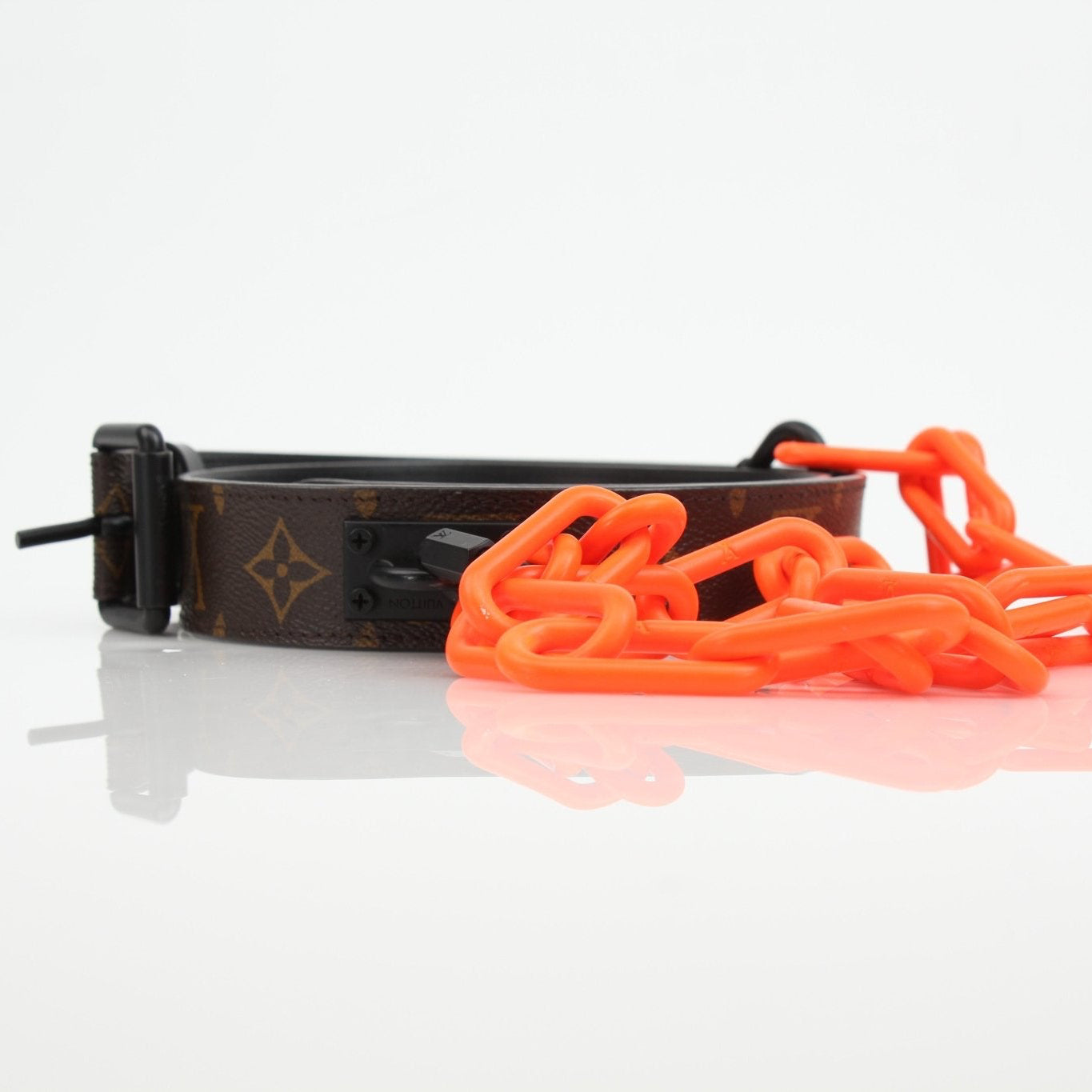 Louis Vuitton Monogram Chain Belt from Gold & Beyond, showcasing the signature monogram design and elegant gold chain detail.