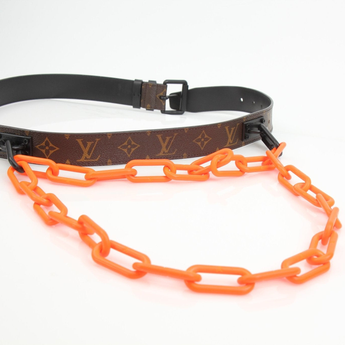 Louis Vuitton Monogram Chain Belt in gold with monogram pattern, stylish accessory from Gold & Beyond.