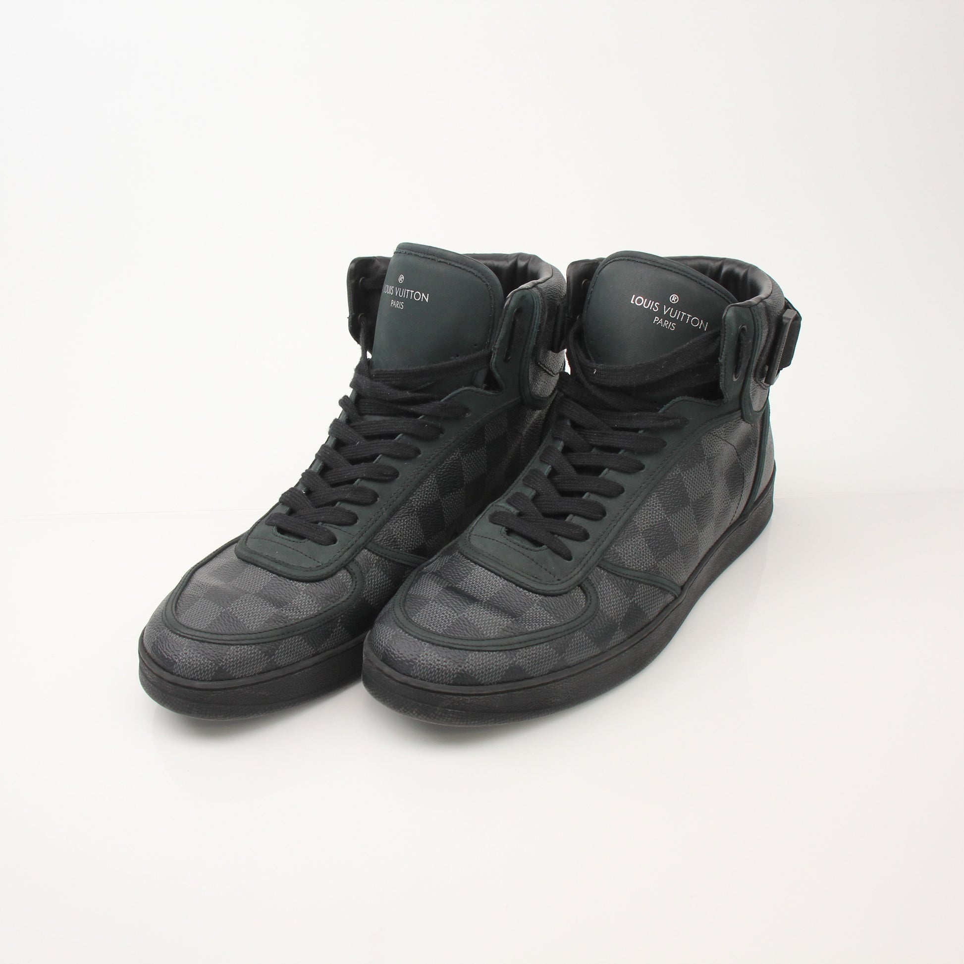 Louis Vuitton Men’s Rivoli High Top Sneakers by Gold & Beyond, stylish black shoes with designer detailing and high-top design.