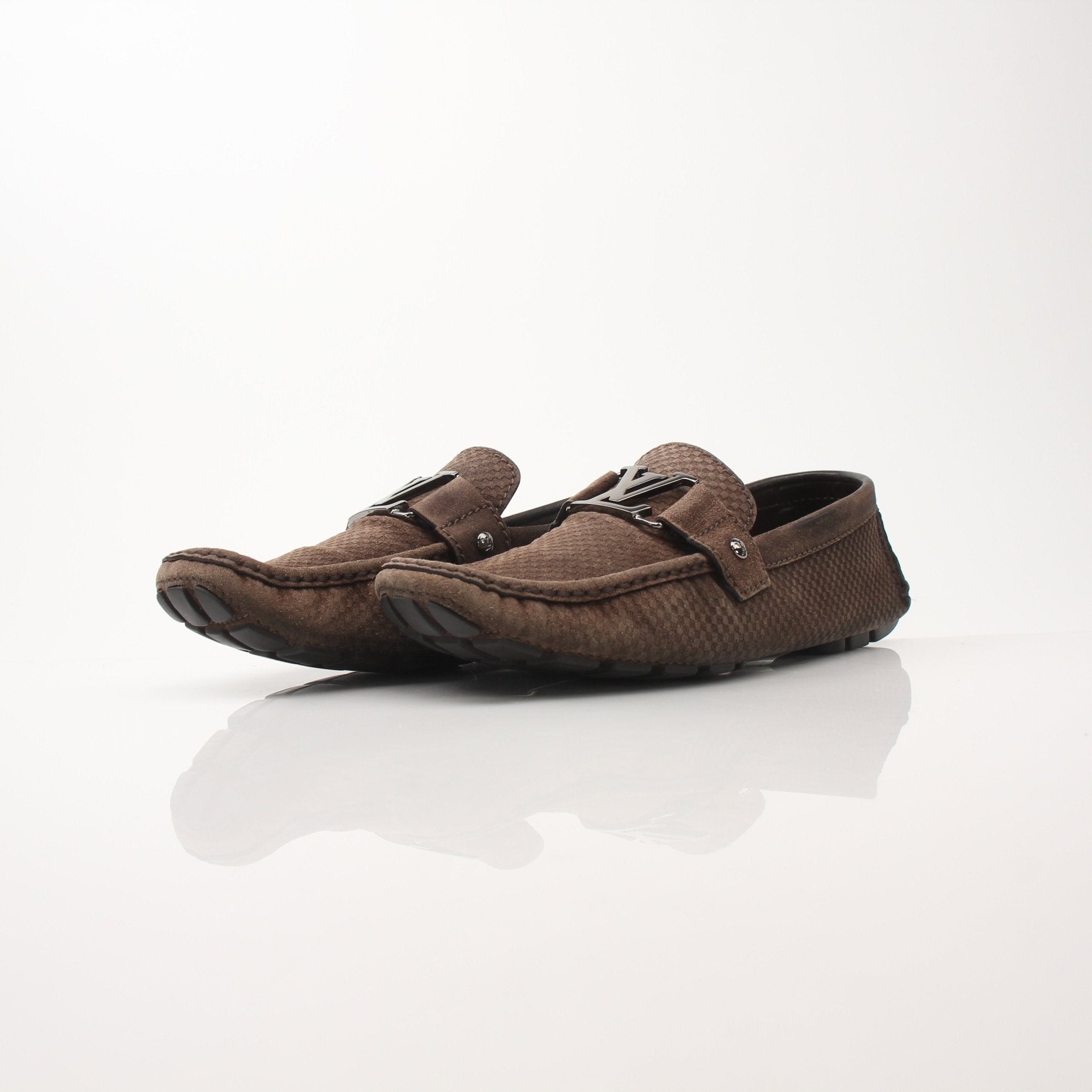 Gold & Beyond Louis Vuitton Hockenheim Moccasin shoes, tan leather with detailed stitching and classic slip-on design.