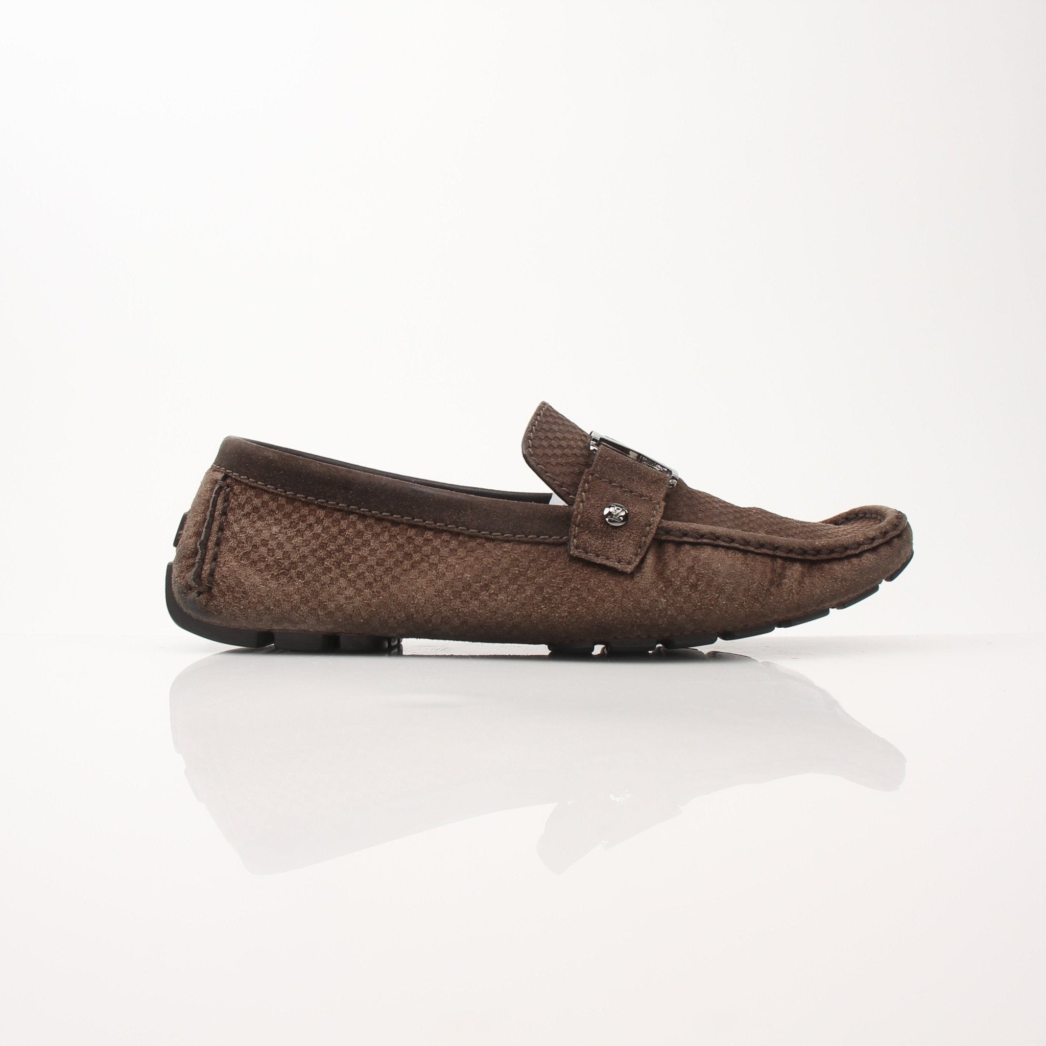 Louis Vuitton Hockenheim Moccasin shoes in brown leather with gold accents, featuring classic design and detailed stitching.