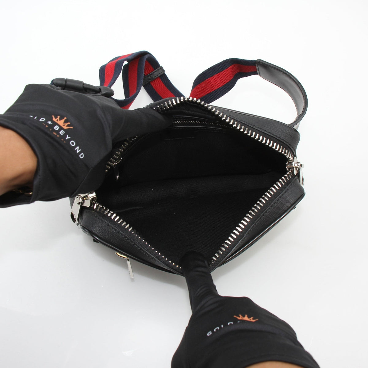 Gucci black GG Supreme web belt bag with adjustable strap and gold hardware, stylish handbag accessory.