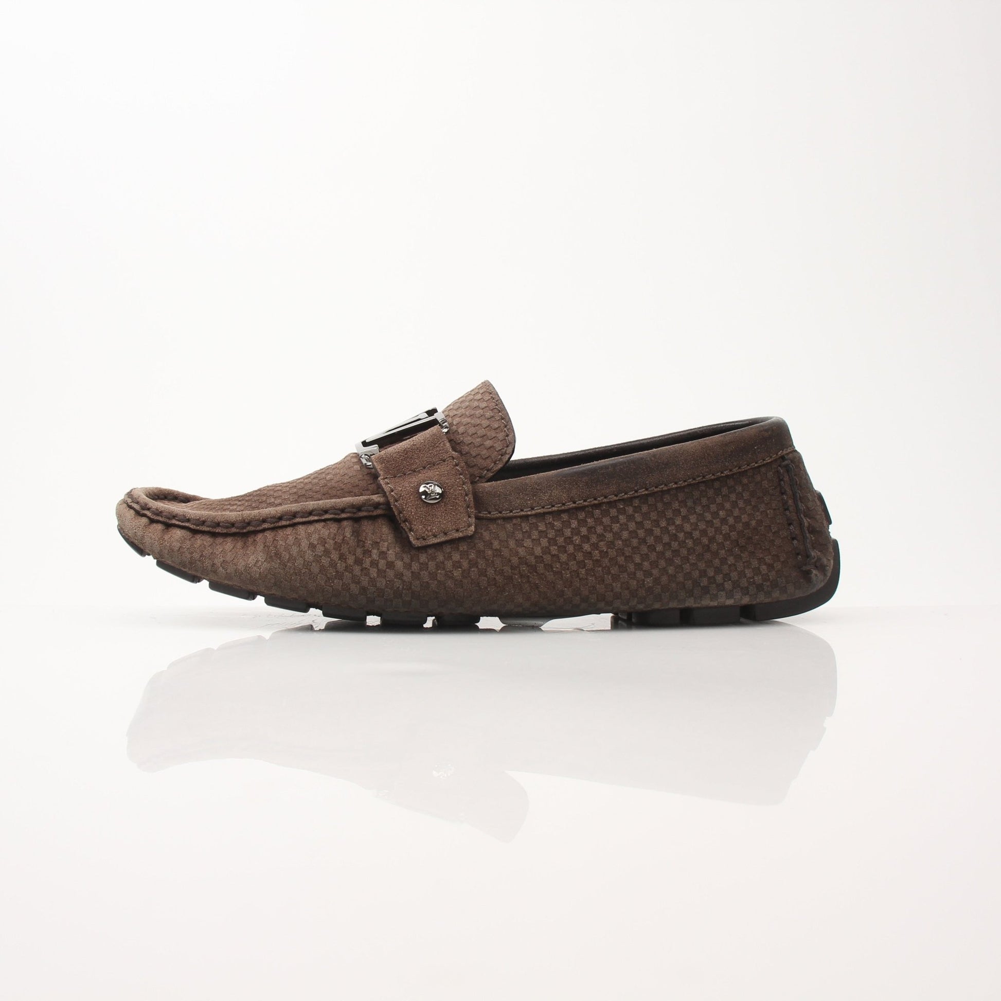 Gold & Beyond Louis Vuitton Hockenheim Moccasin shoes with leather detailing and classic slip-on design.