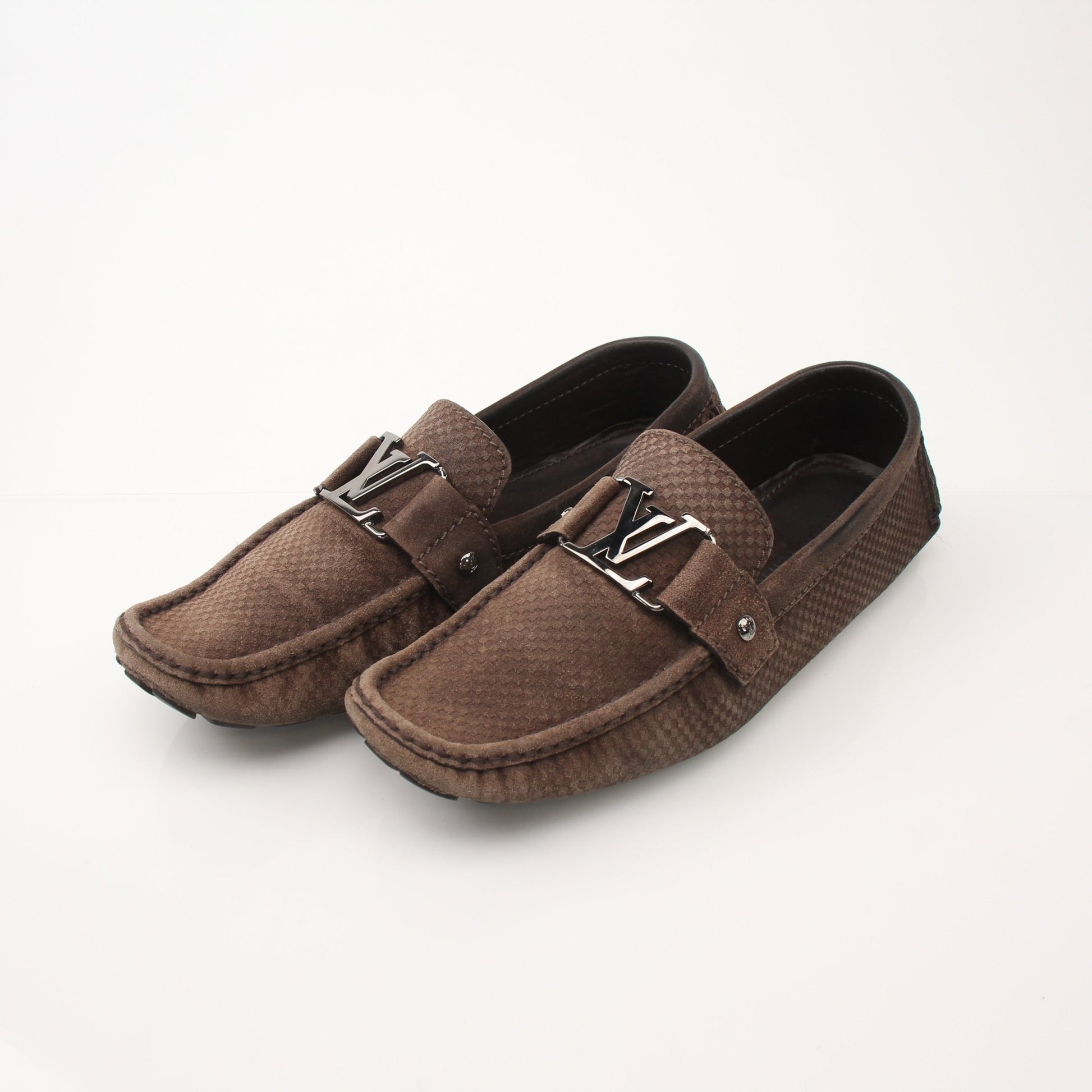 Louis Vuitton Hockenheim Moccasin shoes by Gold & Beyond, featuring brown leather with detailed stitching and classic slip-on design.