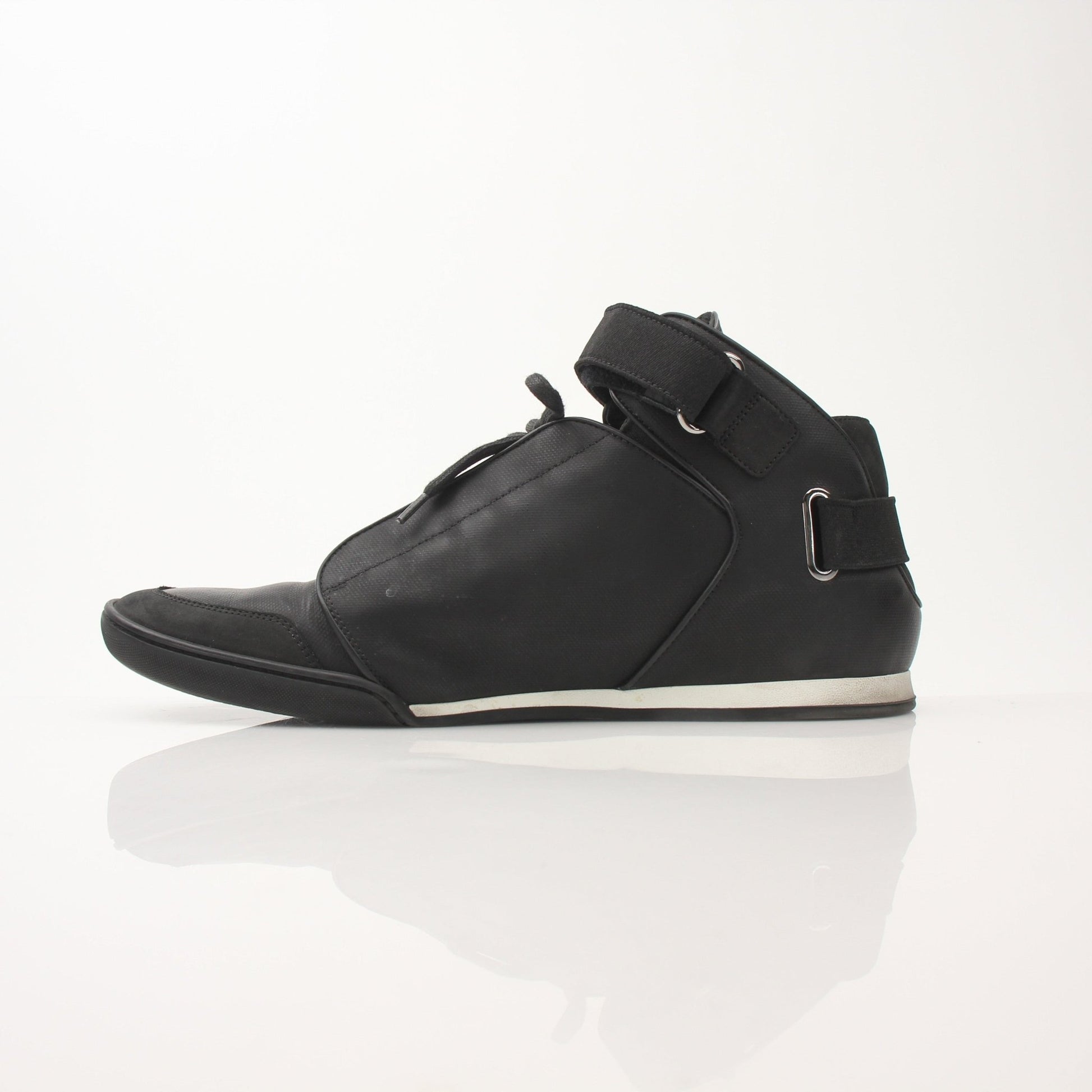 Black Louis Vuitton men's mid-top sneakers by Gold & Beyond, showcasing sleek design and stylish footwear for men.