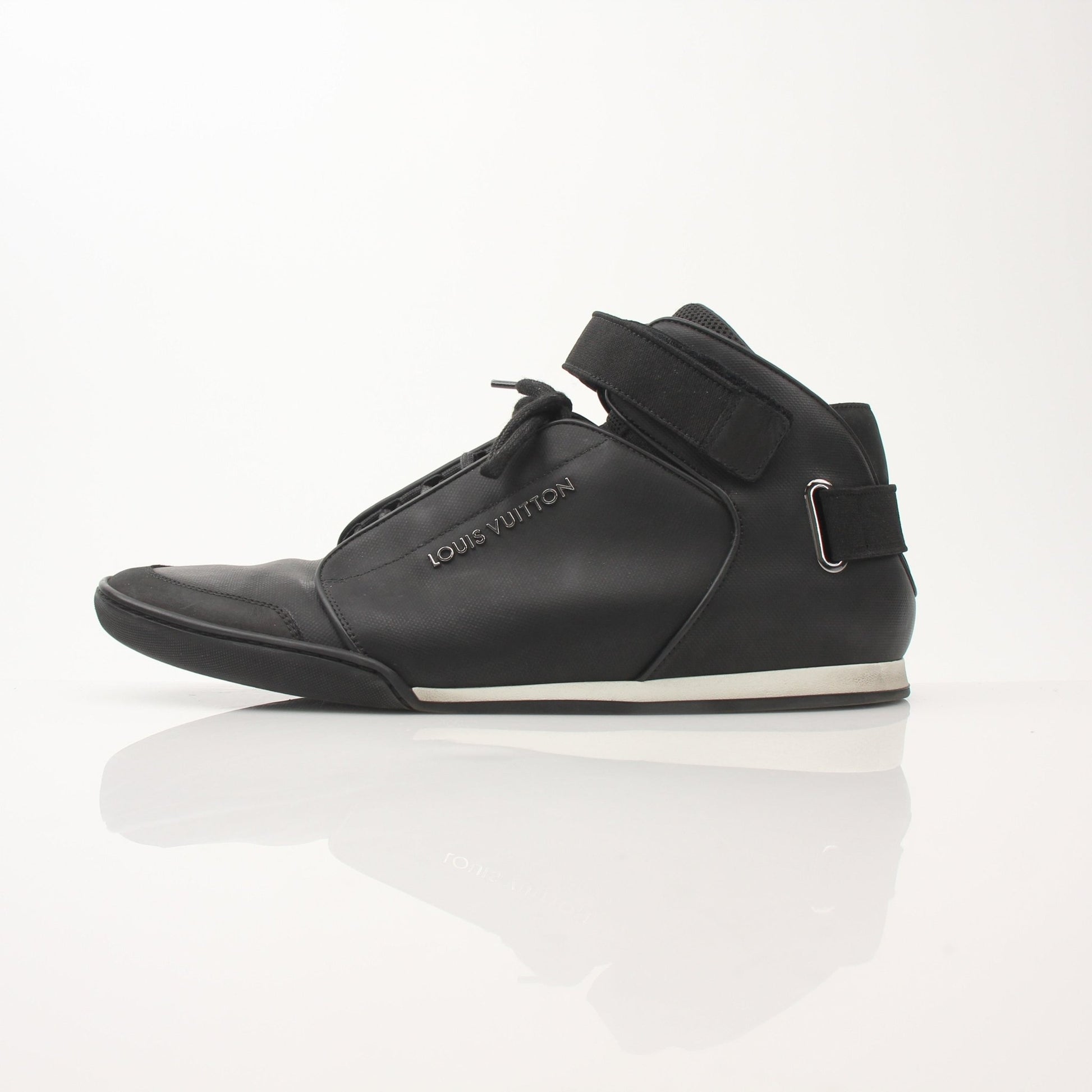 Louis Vuitton men's black mid-top sneakers with gold accents, stylish shoes from Gold & Beyond, showcasing the sleek design.