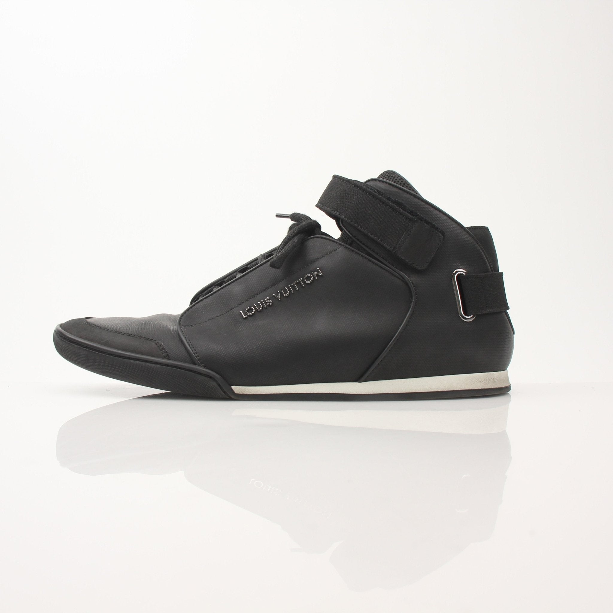 Louis Vuitton men's black mid-top sneakers with gold accents, stylish shoes from Gold & Beyond, showcasing the sleek design.