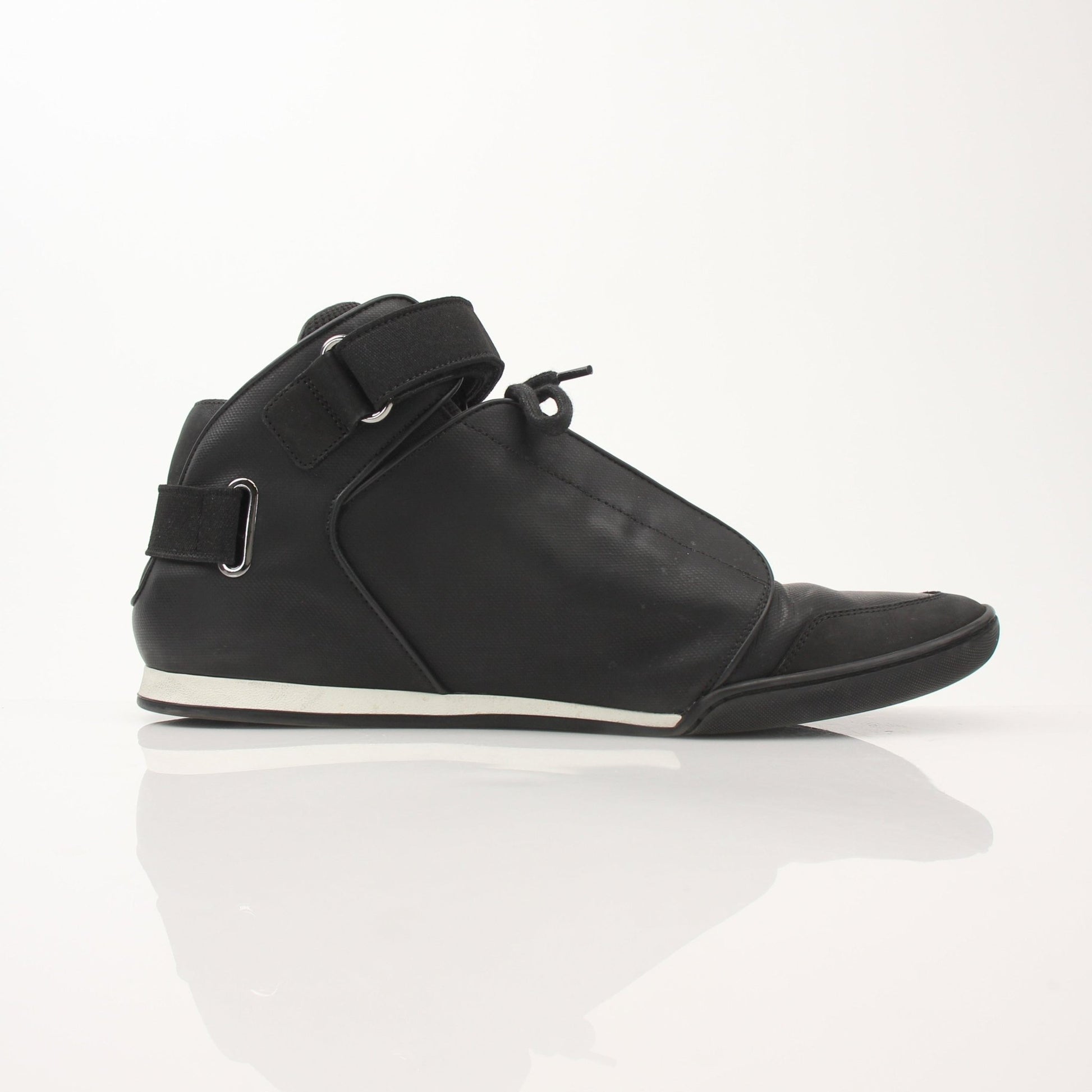 Louis Vuitton men's black mid-top sneakers with stylish design and leather accents, paired with casual and sporty outfits.