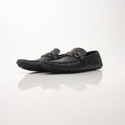 Gold & Beyond Louis Vuitton Hockenheim Moccasin shoes, stylish leather footwear with detailed stitching and classic design.
