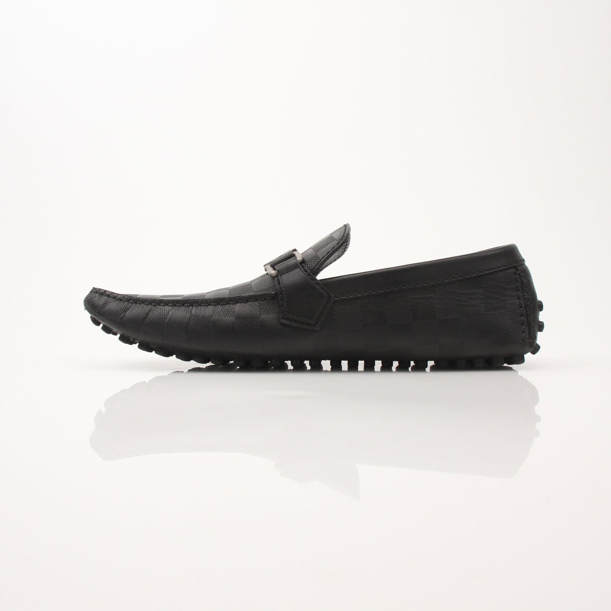 Gold & Beyond Louis Vuitton Hockenheim Moccasin shoes with brown leather, detailed stitching, and classic loafer design.