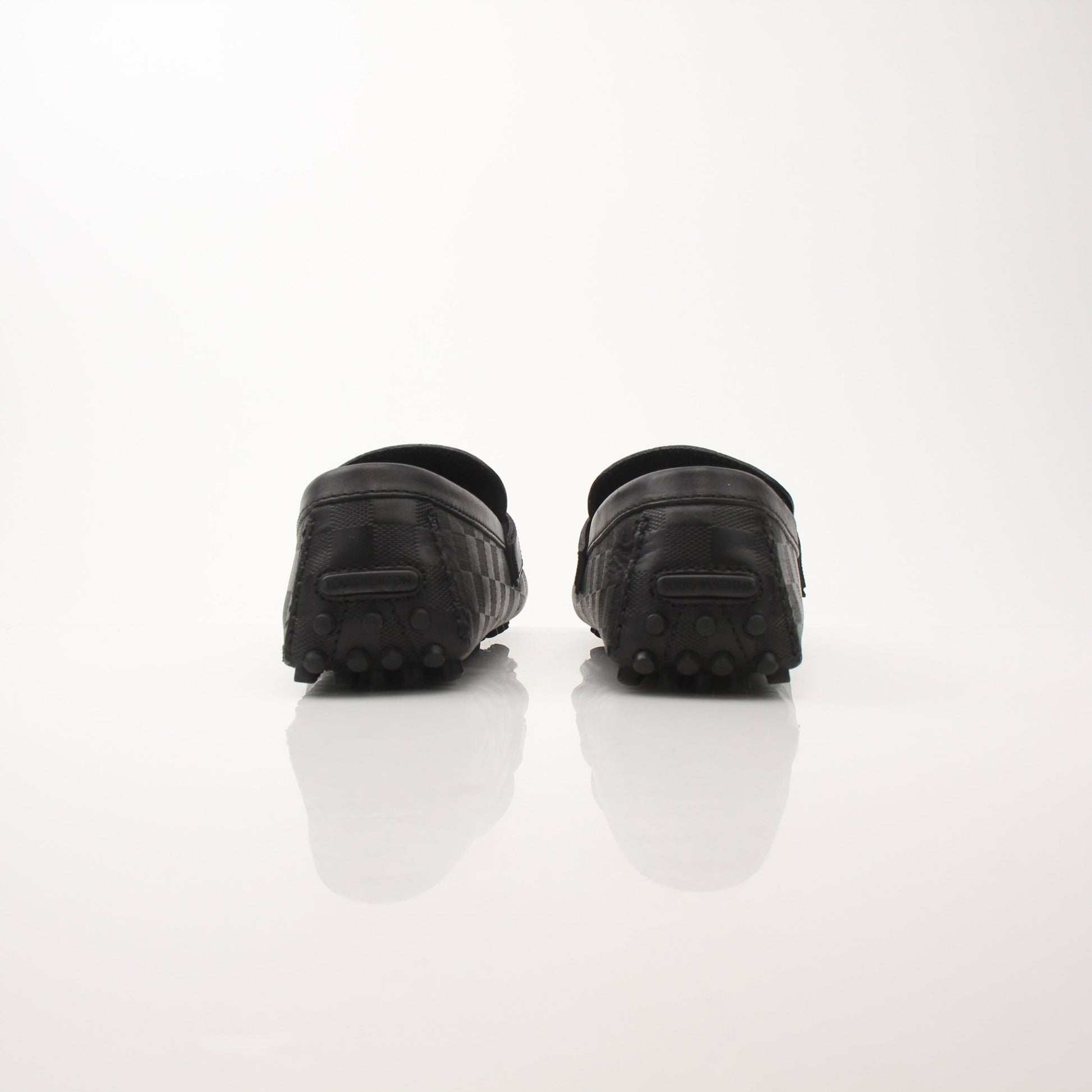 Gold & Beyond Louis Vuitton Hockenheim Moccasin shoes featuring classic design and premium leather craftsmanship.