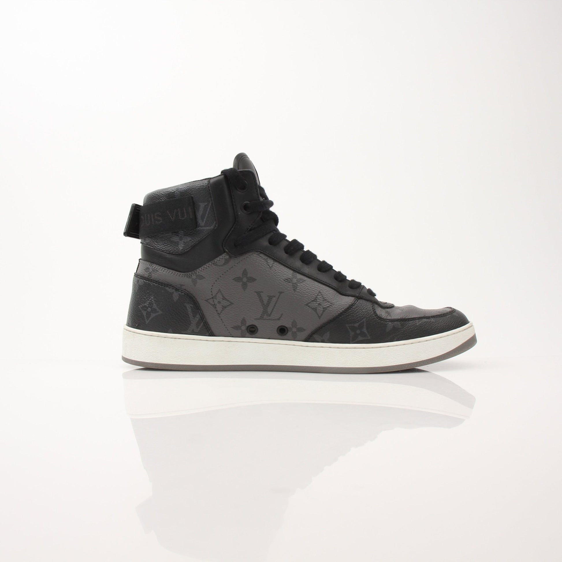 Louis Vuitton Rivoli Trainers by Gold & Beyond, stylish sneakers with classic LV branding and sleek design, shown from the side.