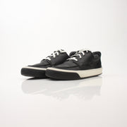 Louis Vuitton Damier low top sneakers in black and brown checkerboard pattern, displayed on a white background.