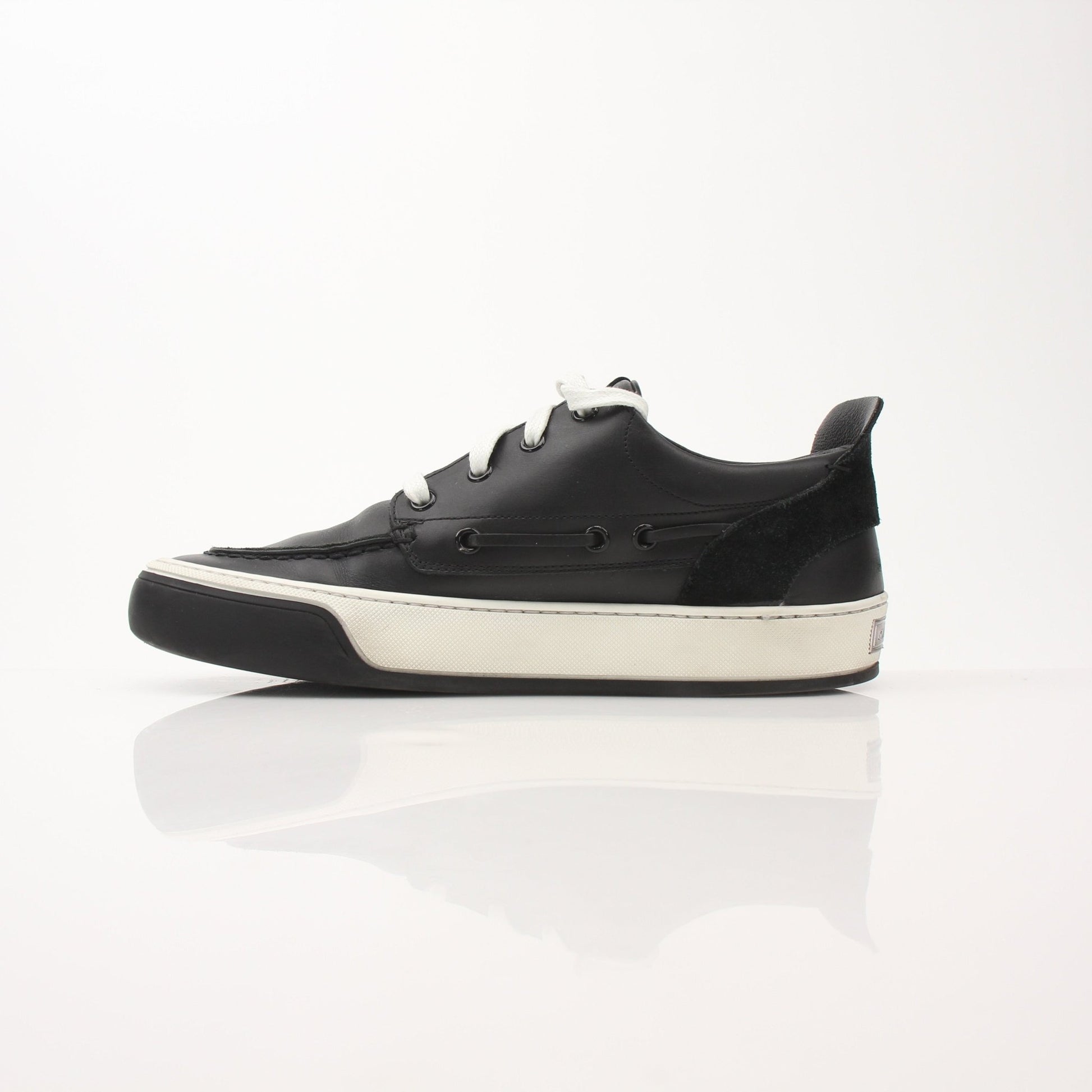 Gold & Beyond Louis Vuitton Damier Low Top Sneakers showing the brown and beige Damier pattern and white rubber soles.