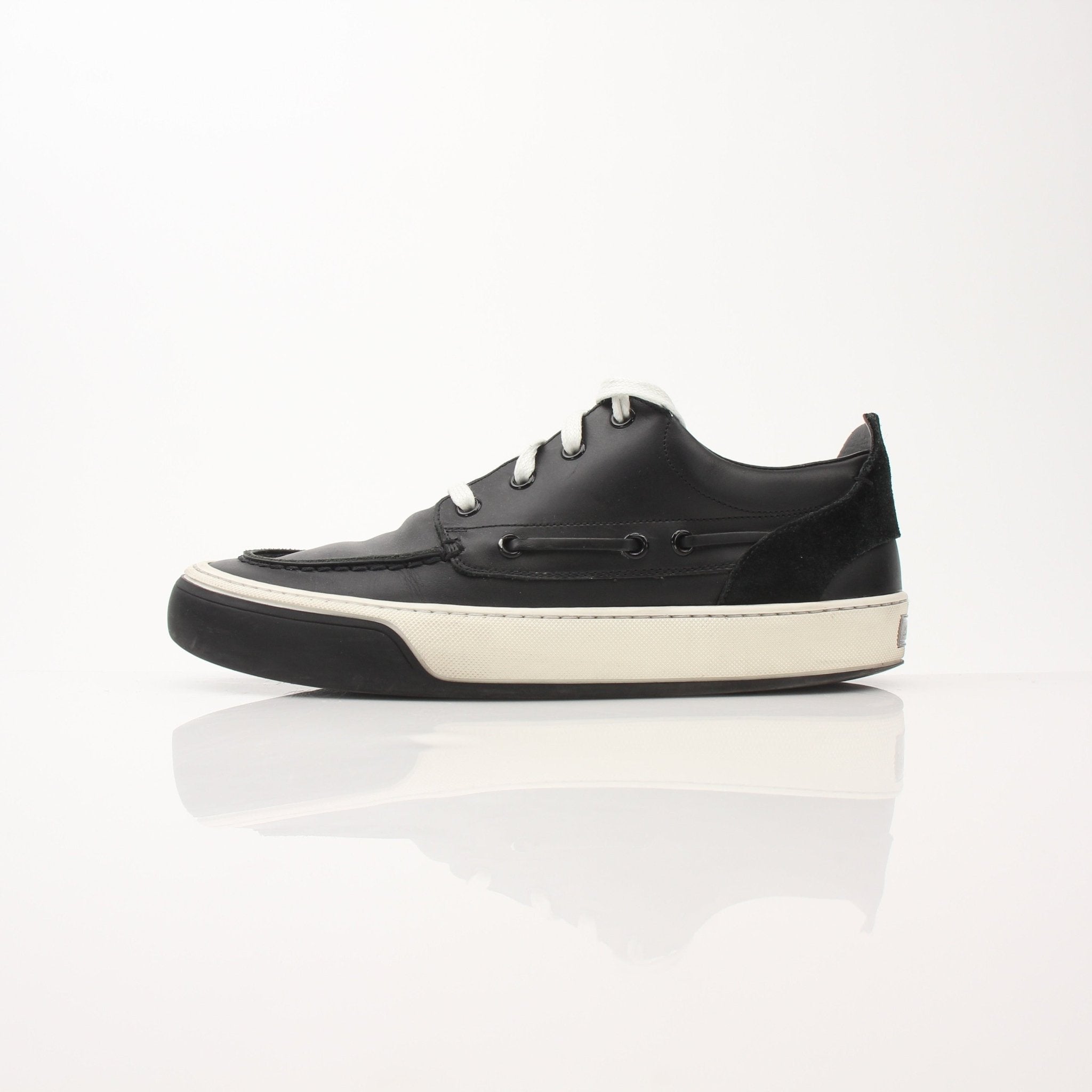 Gold & Beyond Louis Vuitton Damier low top sneakers with checkered pattern and casual slip-on style, showcasing their stylish design.